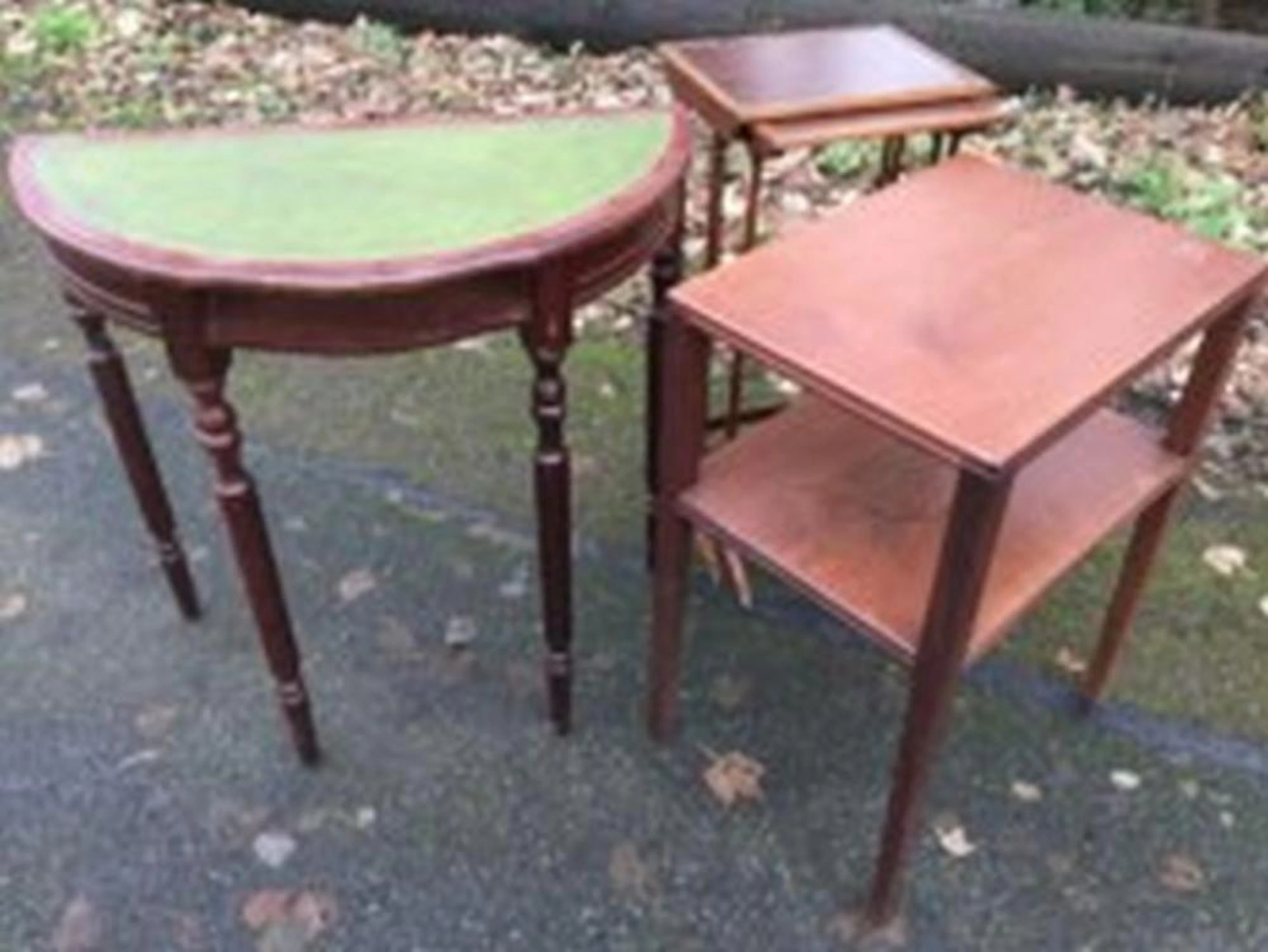 A nest of two inlaid mahogany tables on slender legs; a rectangular teak si