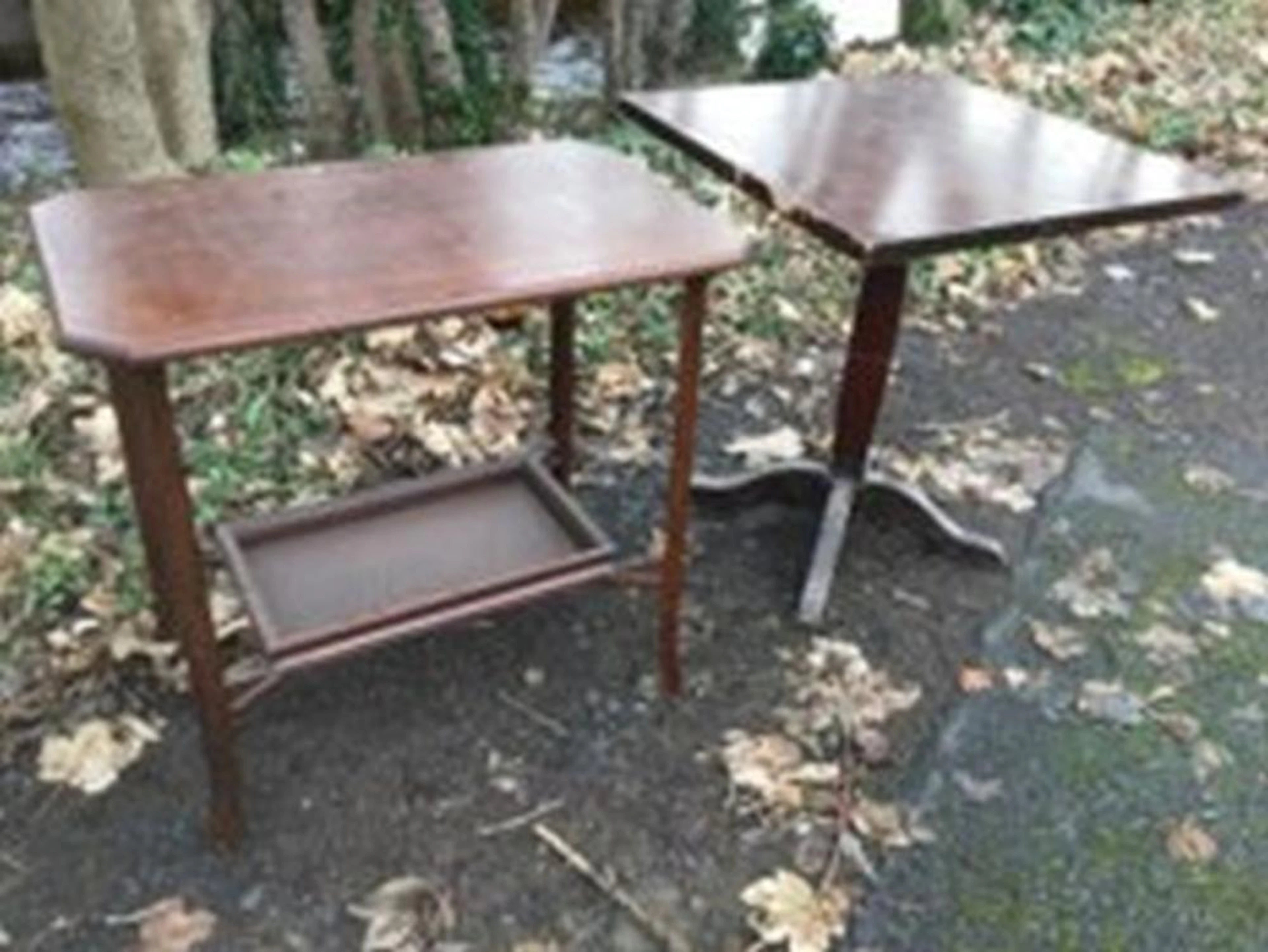 A rectangular Edwardian oak table with moulded top having canted corners on