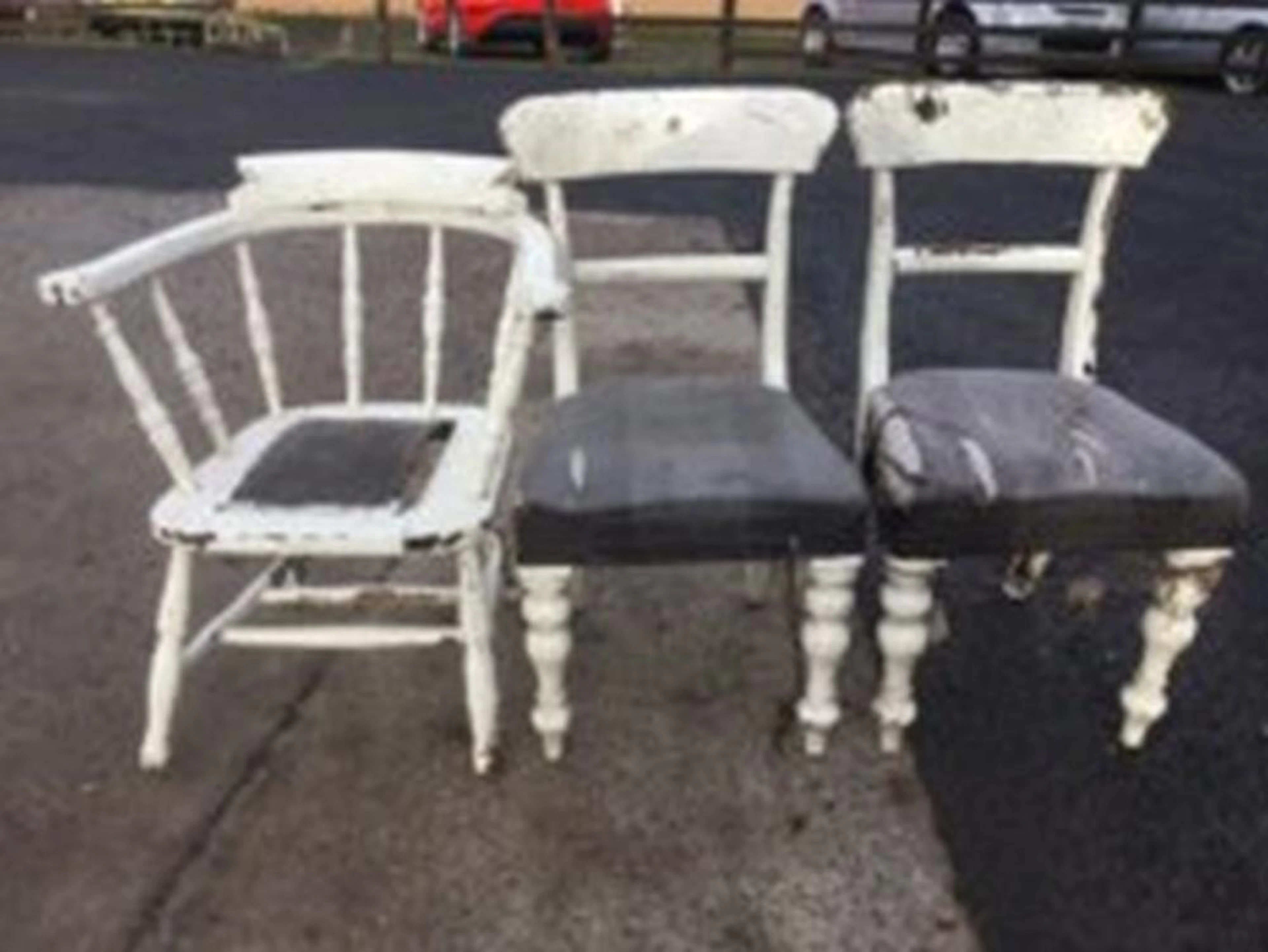 A painted smokers bow armchair, formerly with upholstered seat; and a pair