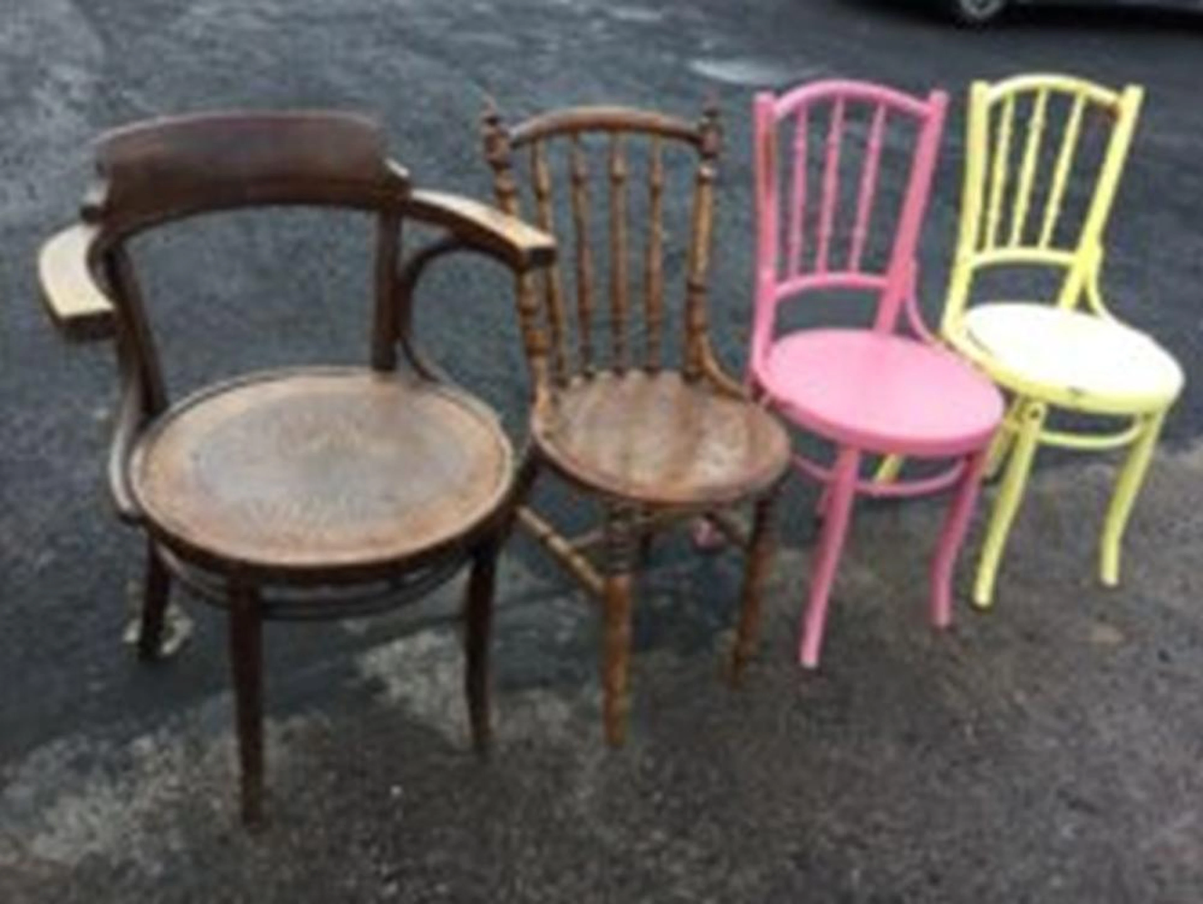 Four bentwood chairs - an armchair with circular shell pressed seat, a pair