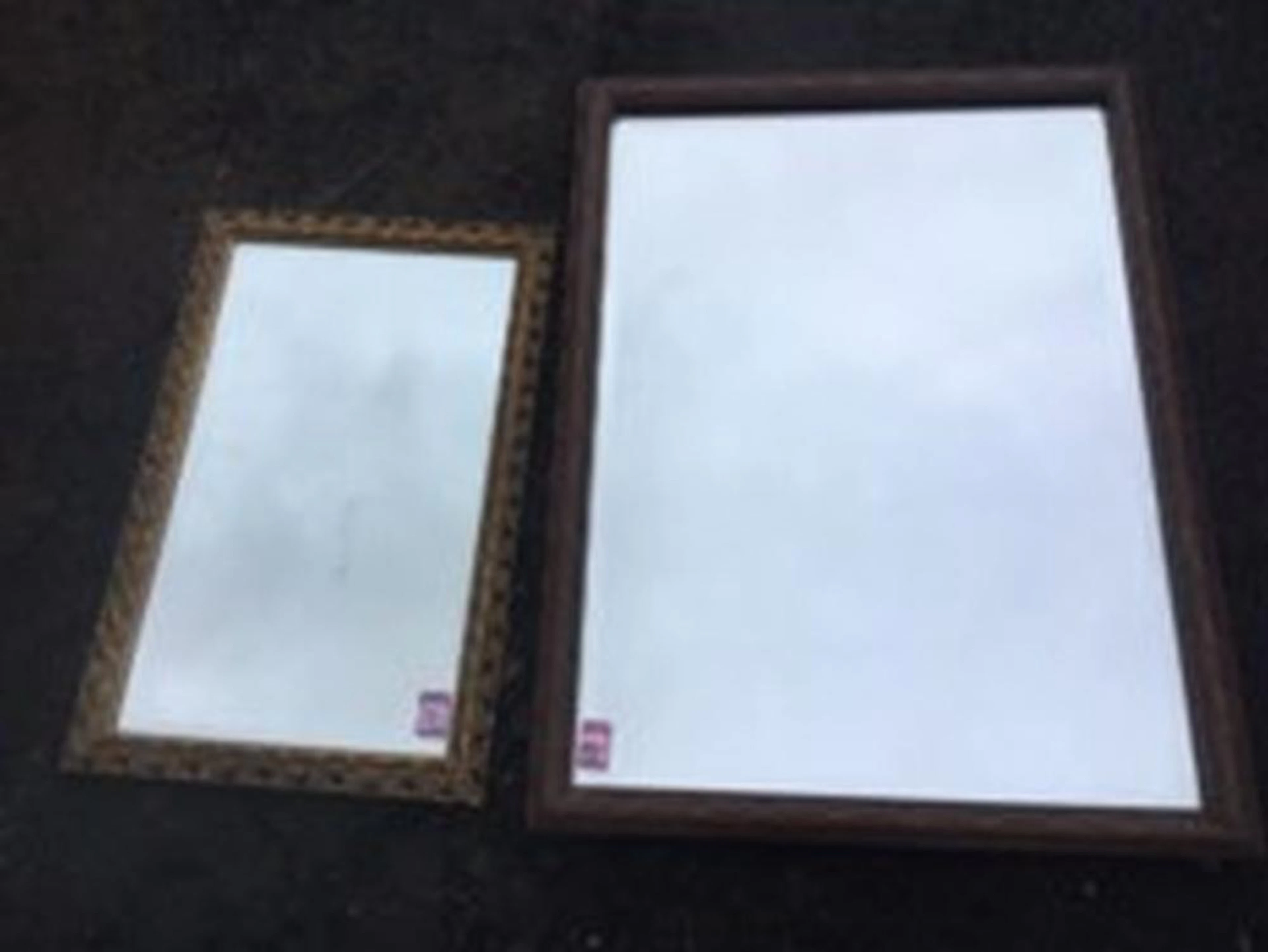 A rectangular bevelled mirror in lozenge carved hardwood frame; and a gilt