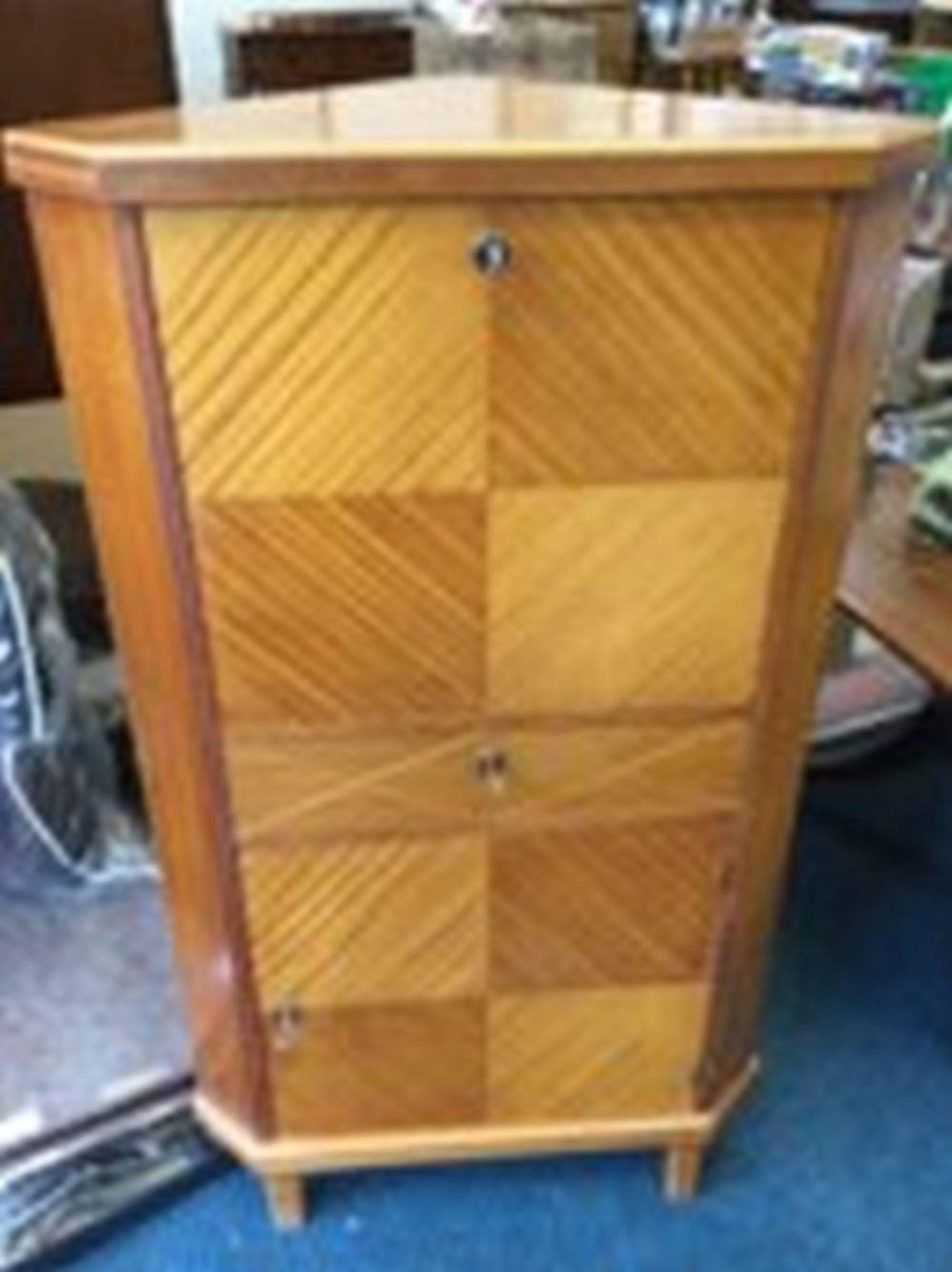 A 60s vintage mahogany corner bureau, with quarter veneered doors and boxwo