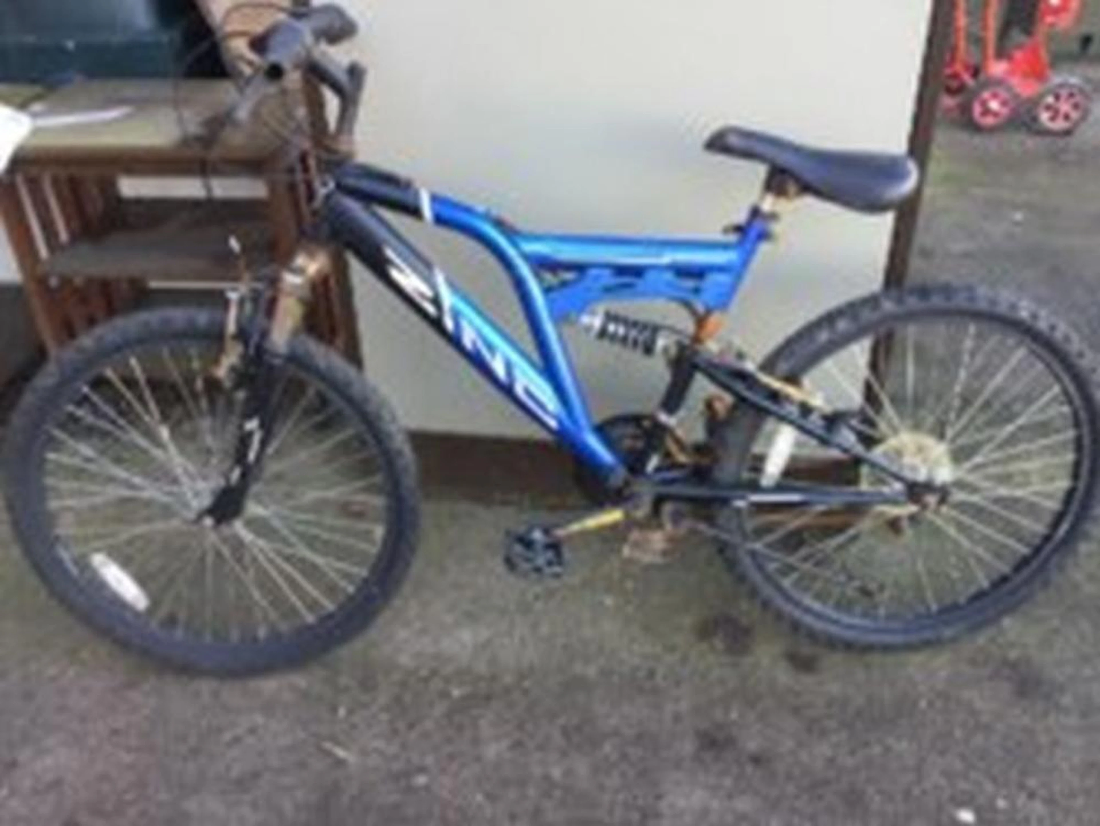 A Zinc cross-country bike with sprung frame, padded seat, tons of gears, st