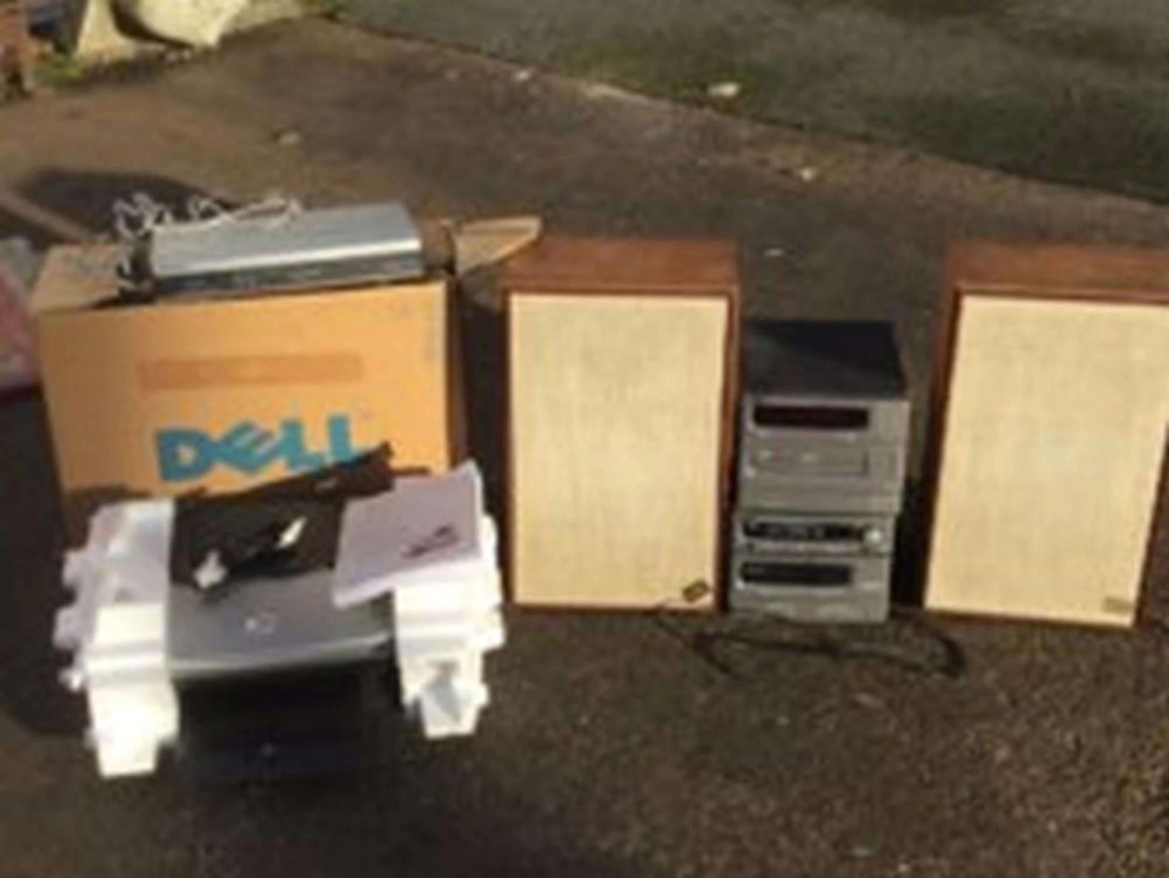 A Denon hi-fi stack with a pair of AR-6 speakers; a boxed Dell All-in-One A