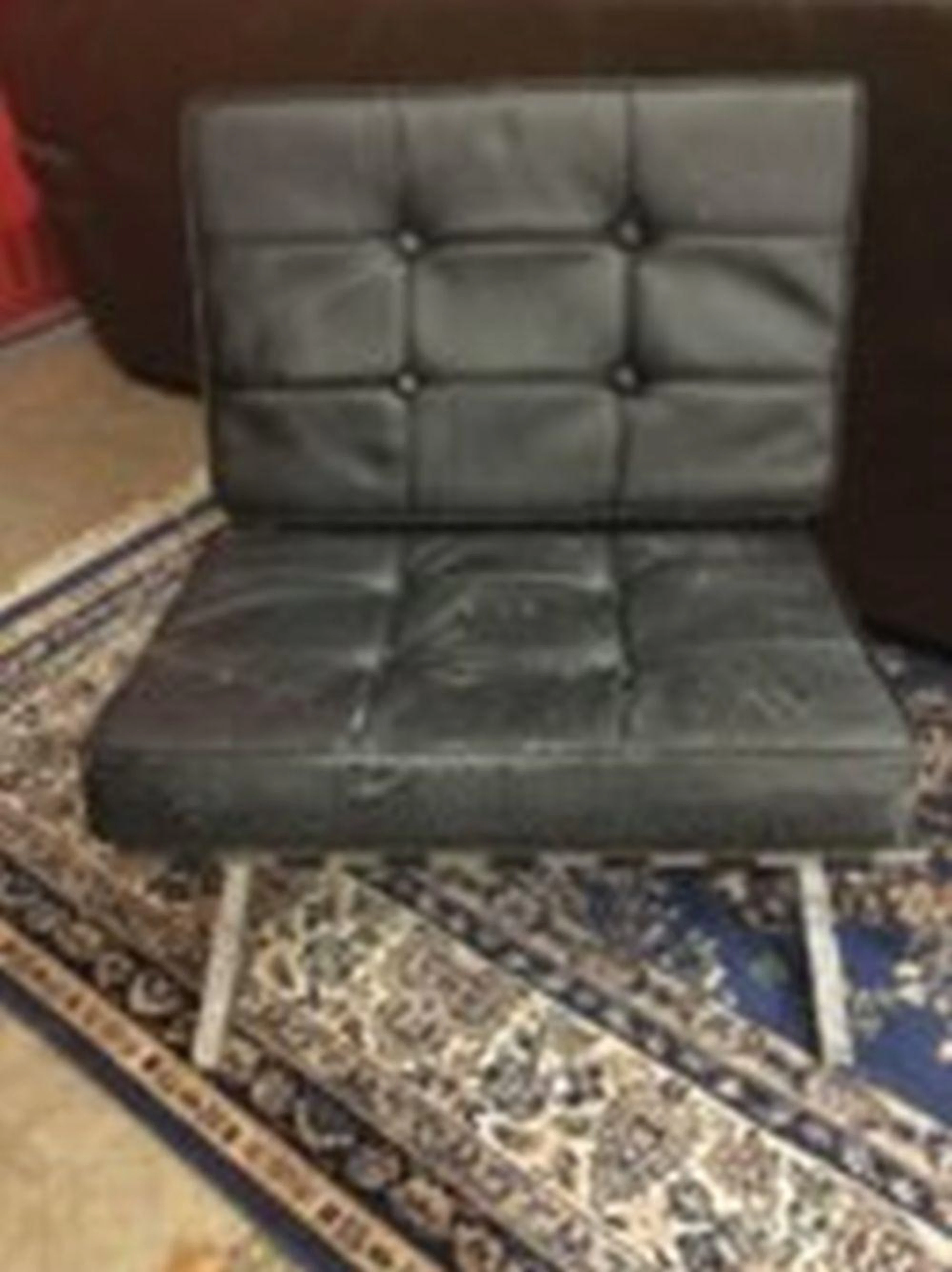 An Italian Mies van Der Rohe Barcelona chrome chair with webbed back & sea