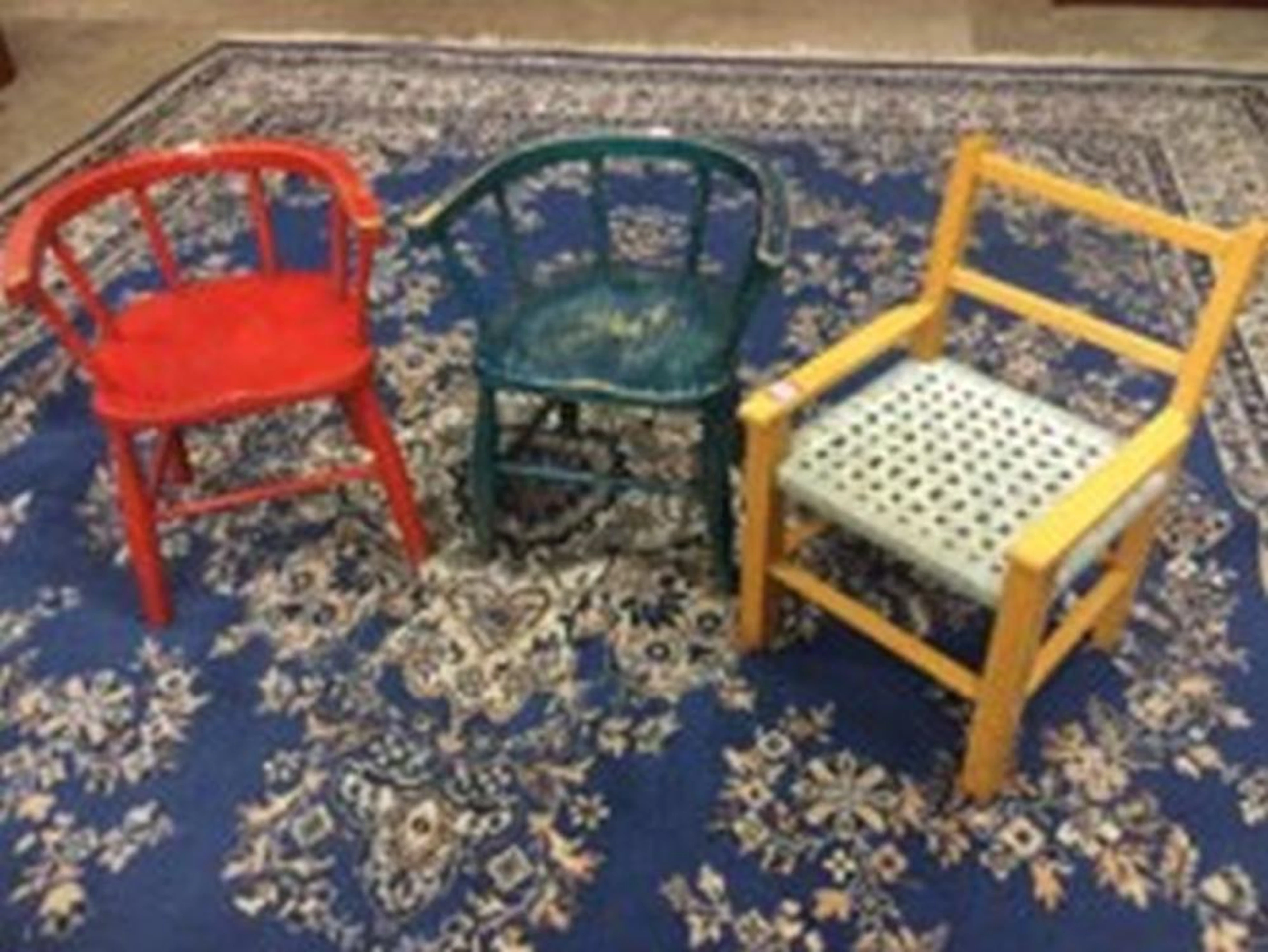 A pair of elm childs chairs with bow backs on spindles above solid seats, r