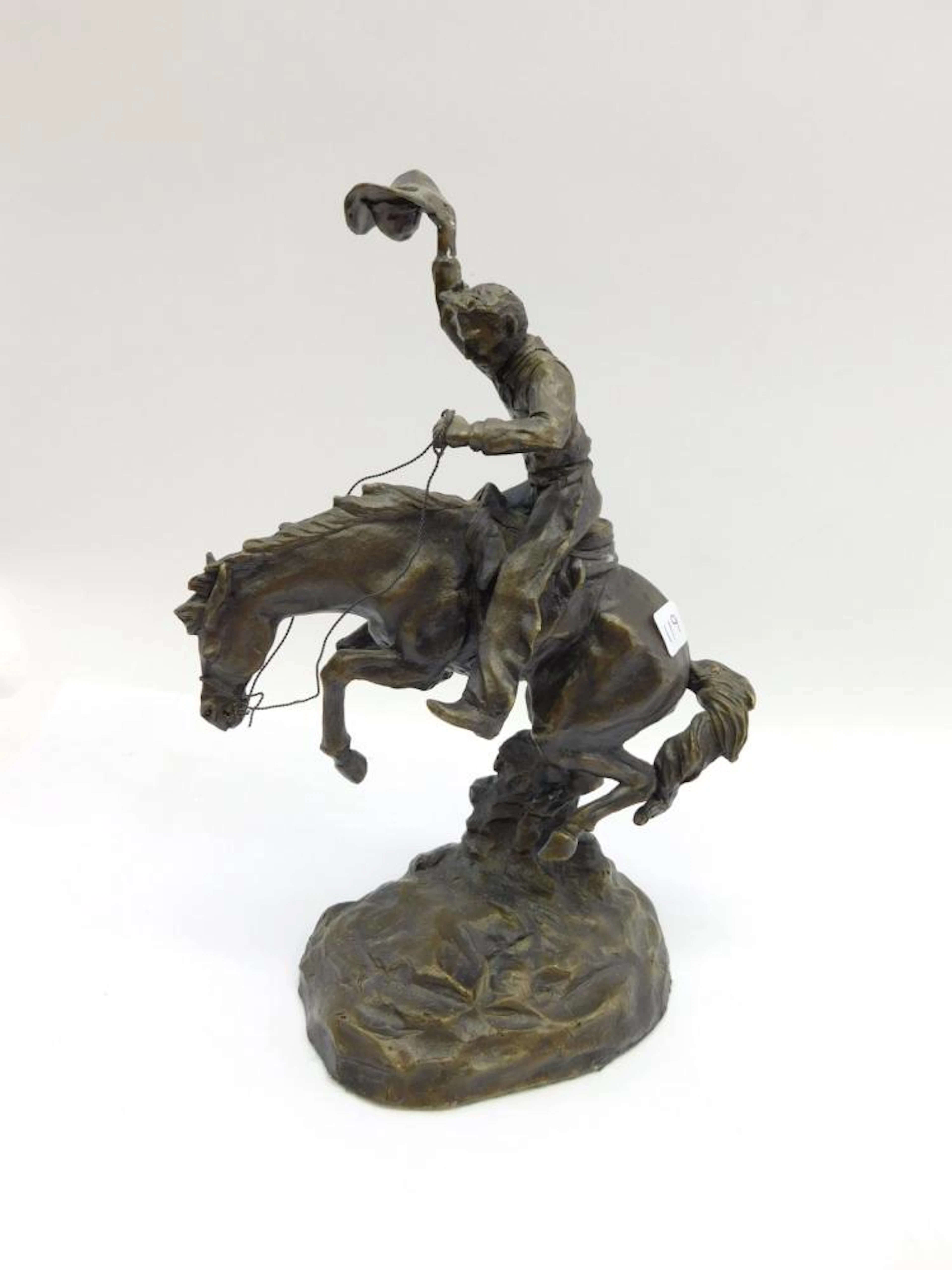 Small Metal Bronze Western Cowboy Riding A Jumping Horse Sculpture