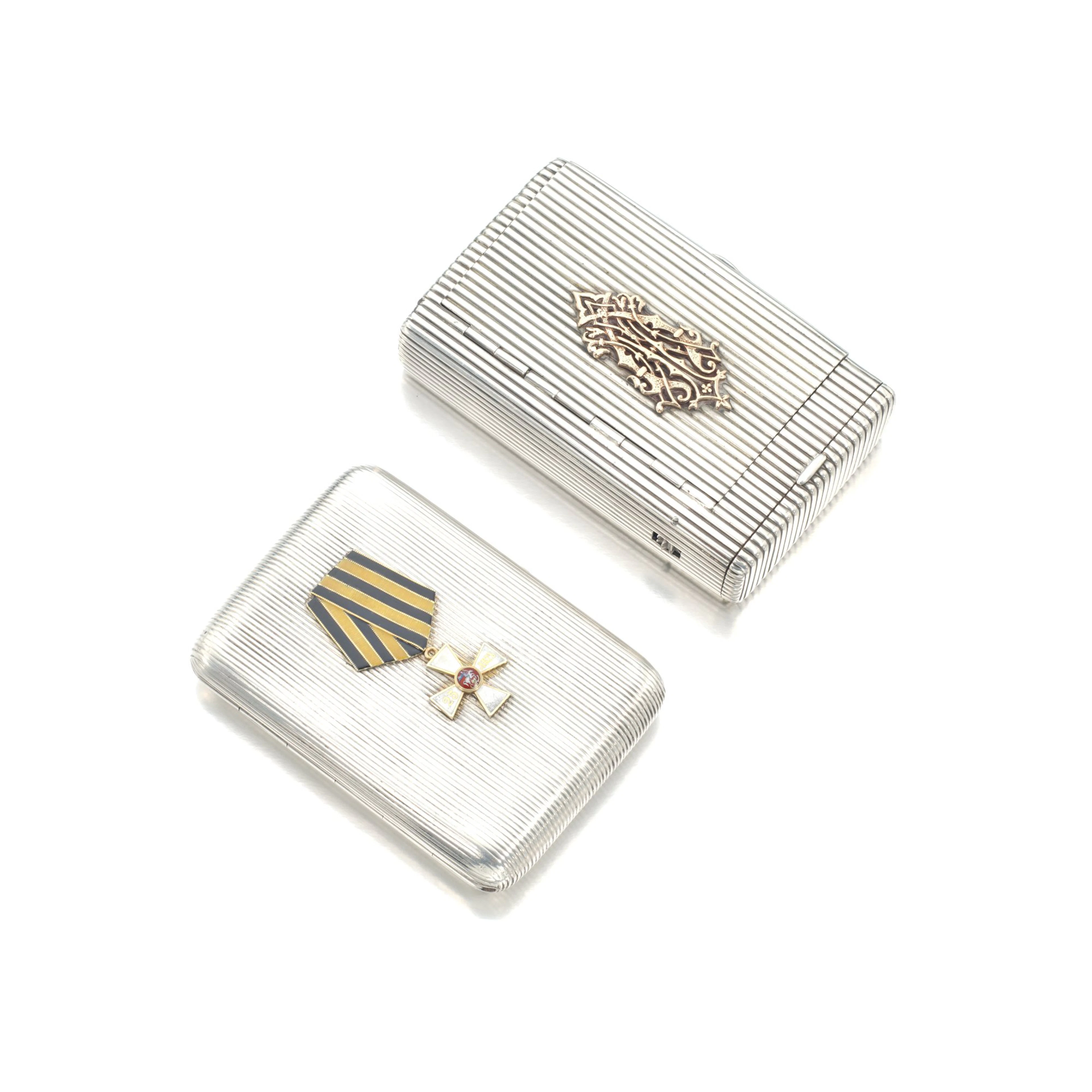 A gold mounted silver cigarette case together with a...