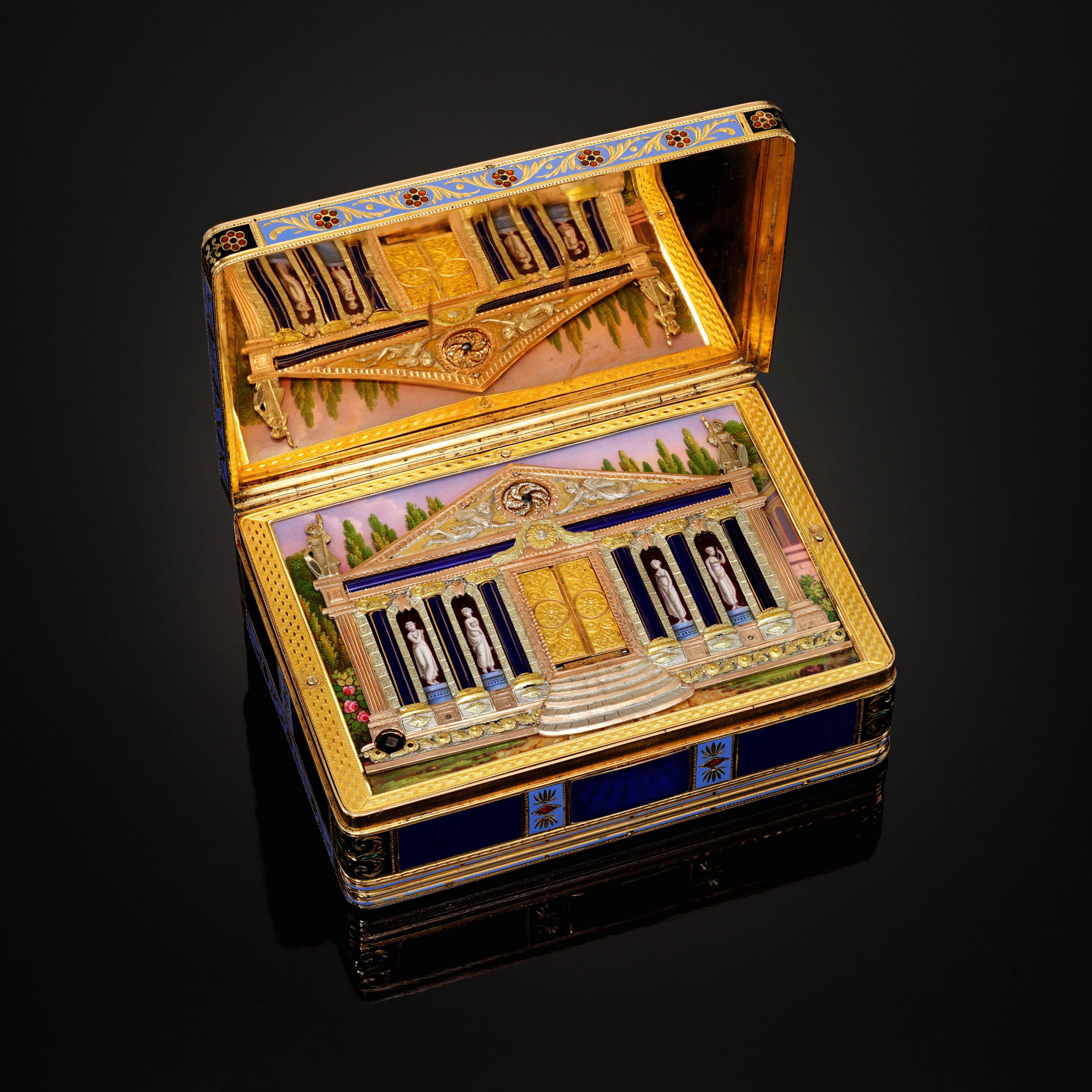 A rare pearl-set four-coloured gold and enamel musical...