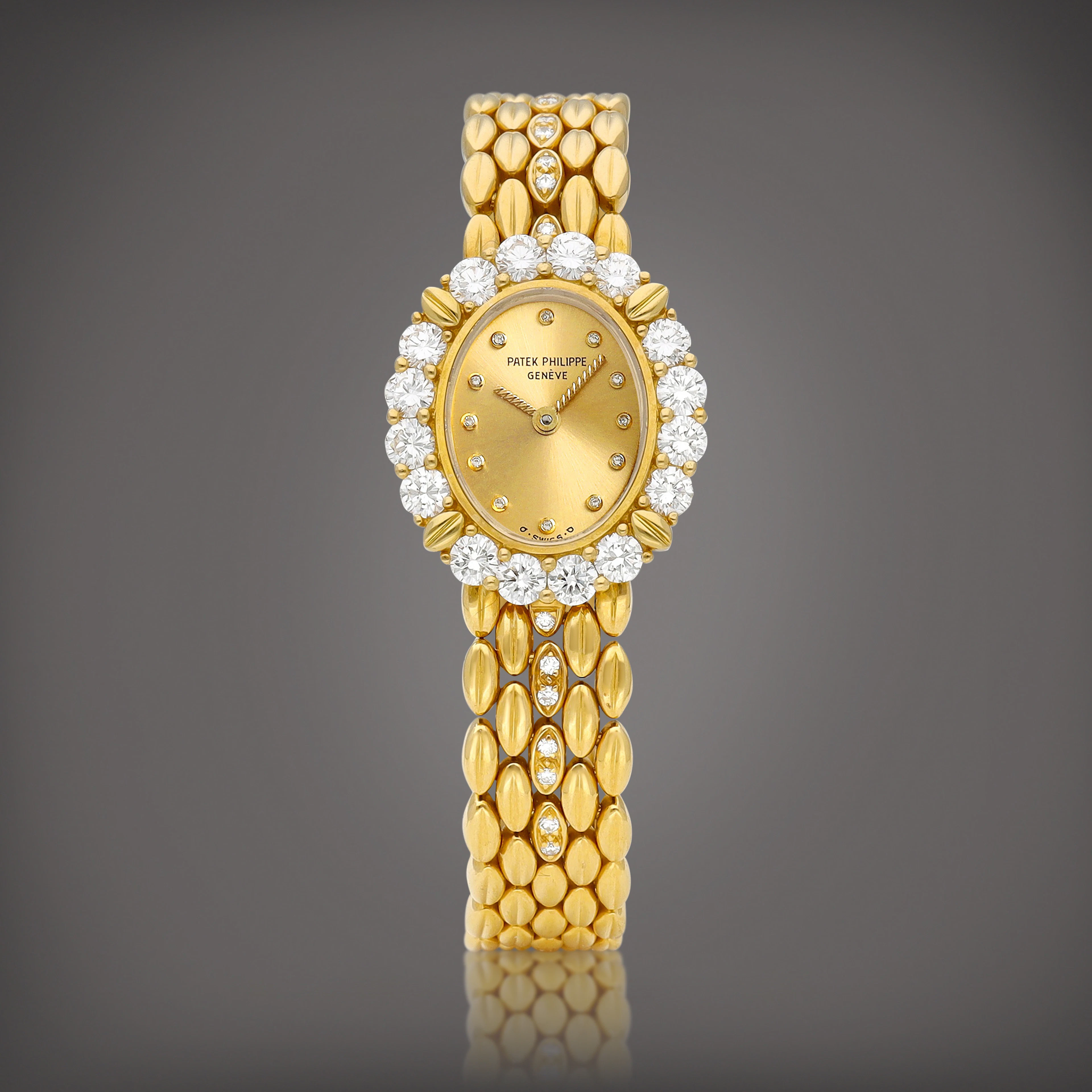 Patek Philippe | Reference 4754 | A yellow gold and diamond-set bracelet watch