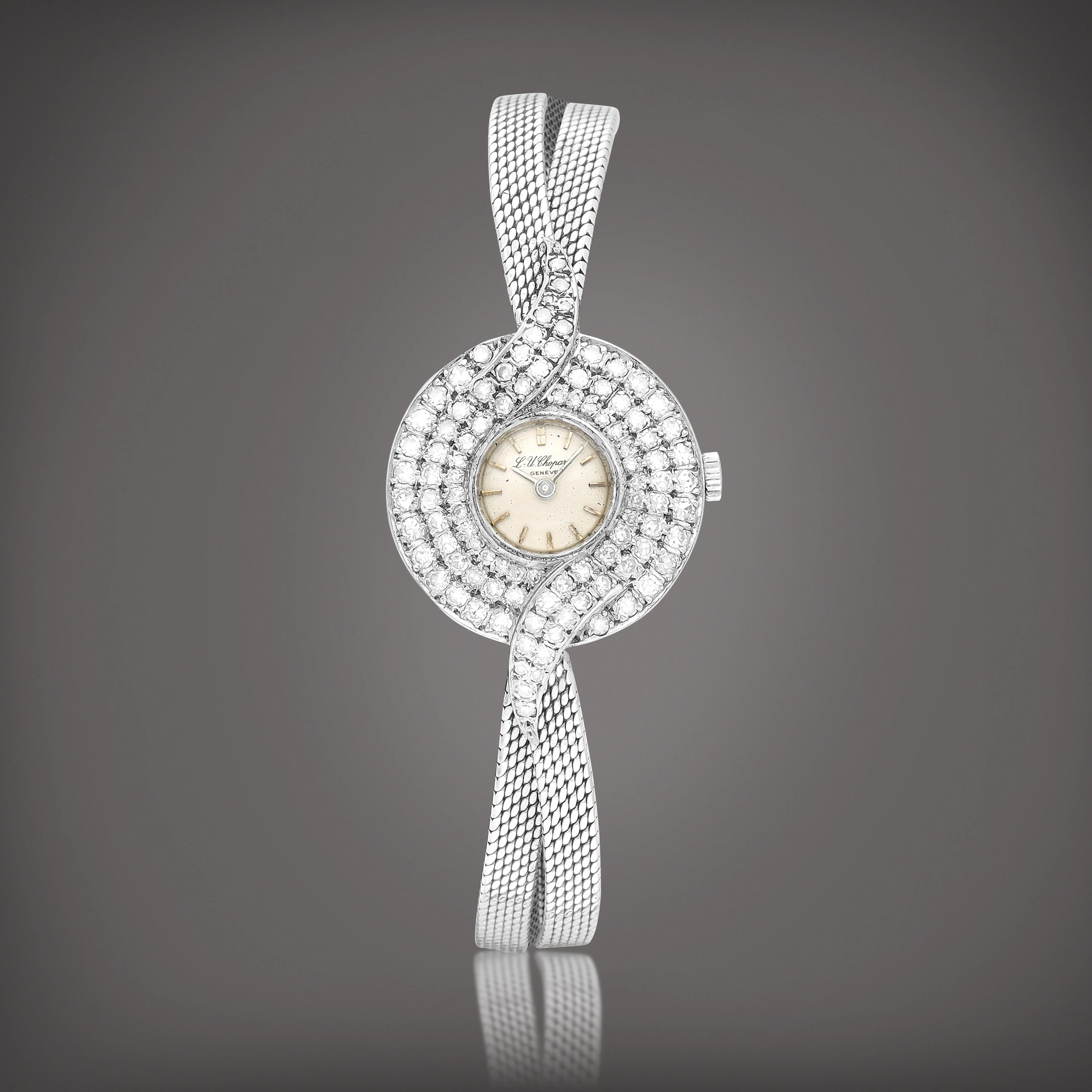A white gold and diamond-set bracelet watch, Circa 1990 | 蕭邦 | 白金鑲鑽石鏈帶腕錶，約1990年製