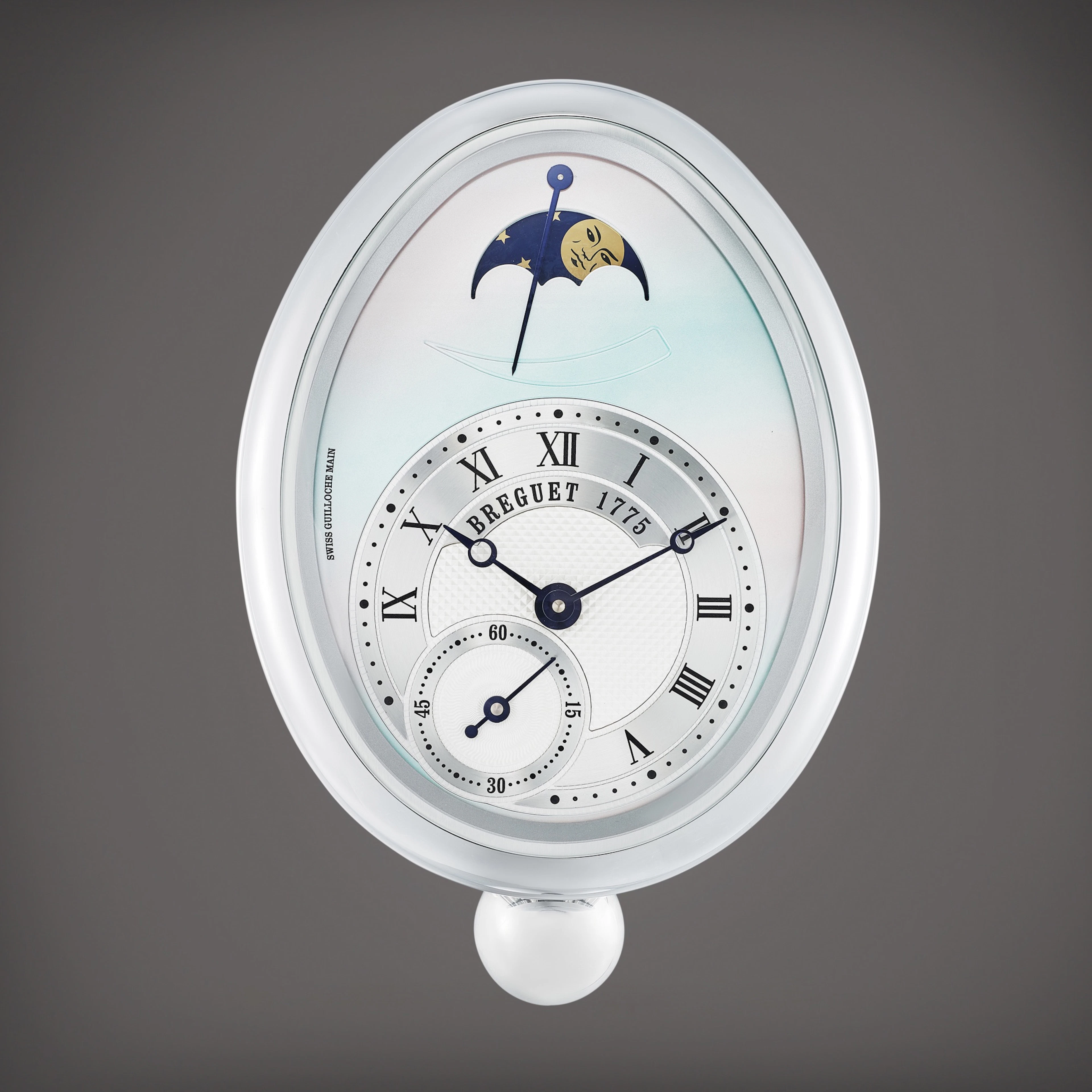 Reine de Naples | A metalwork wall clock