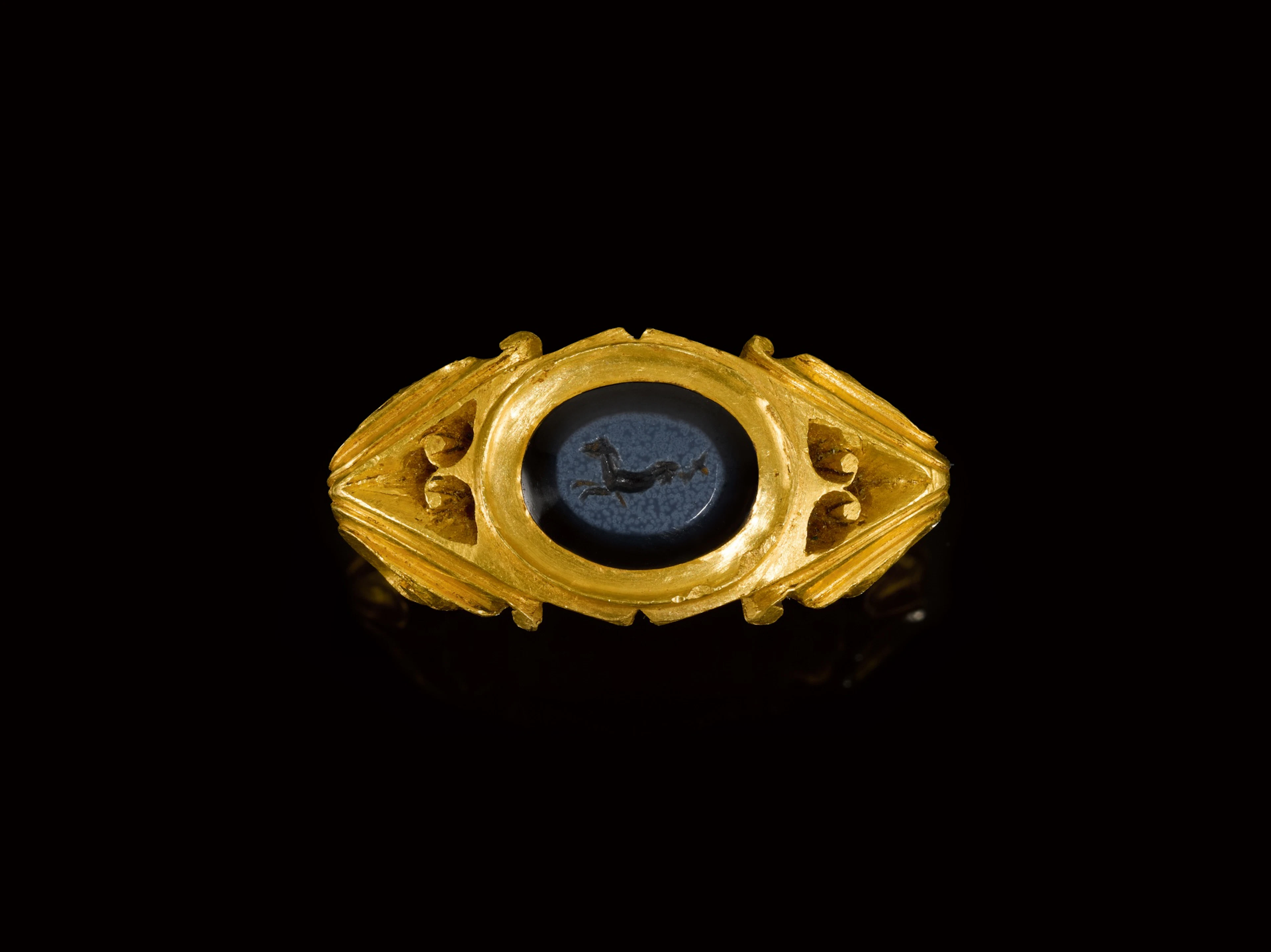 A Roman Gold Ring with Nicolo Intaglio, circa 3rd Century A.D.