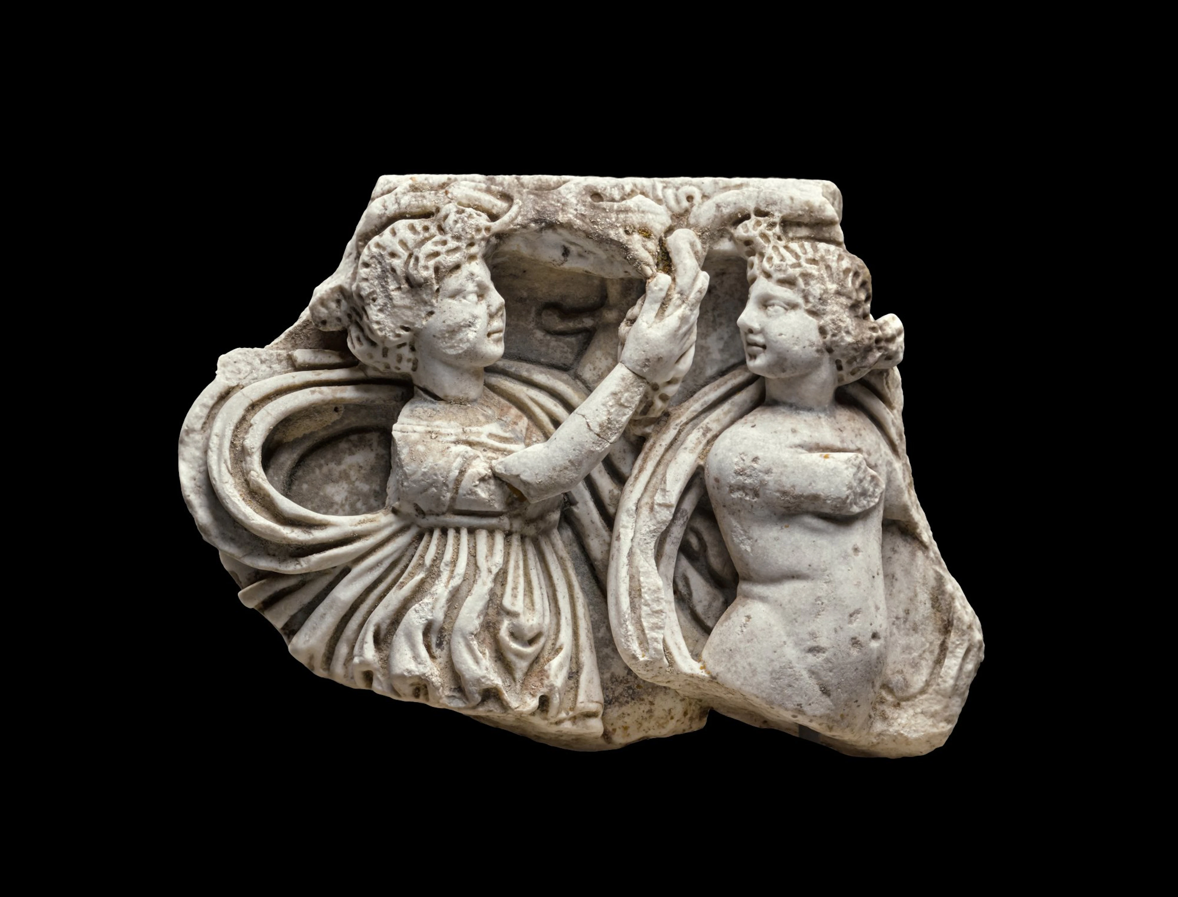 A Roman Marble Dionysiac Sarcophagus Relief Fragment, circa 3rd century A.D.