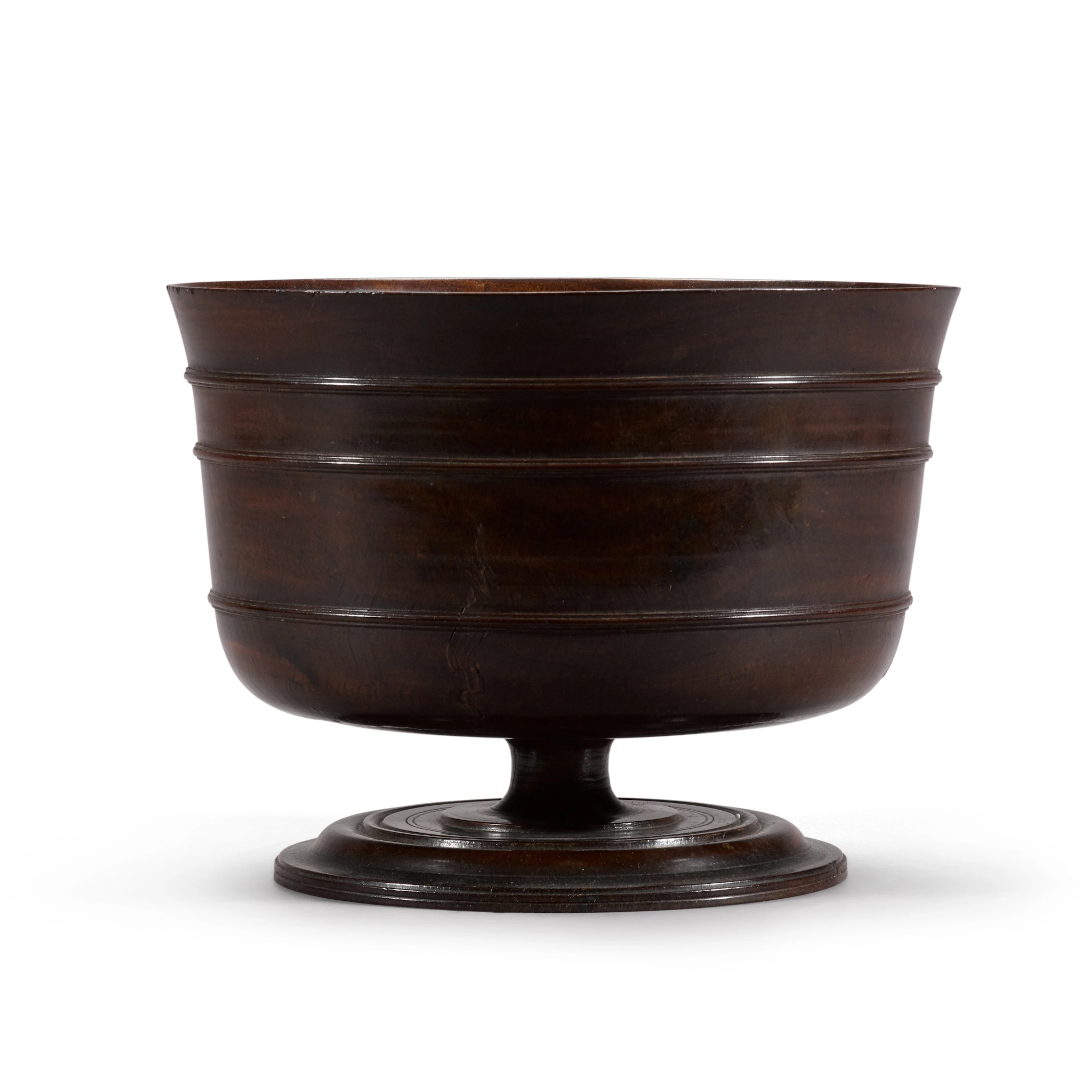 A Charles II turned lignum vitae wassail bowl, late 17th century