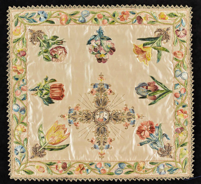 A fine silk and metal-thread embroidered ivory satin chalice veil