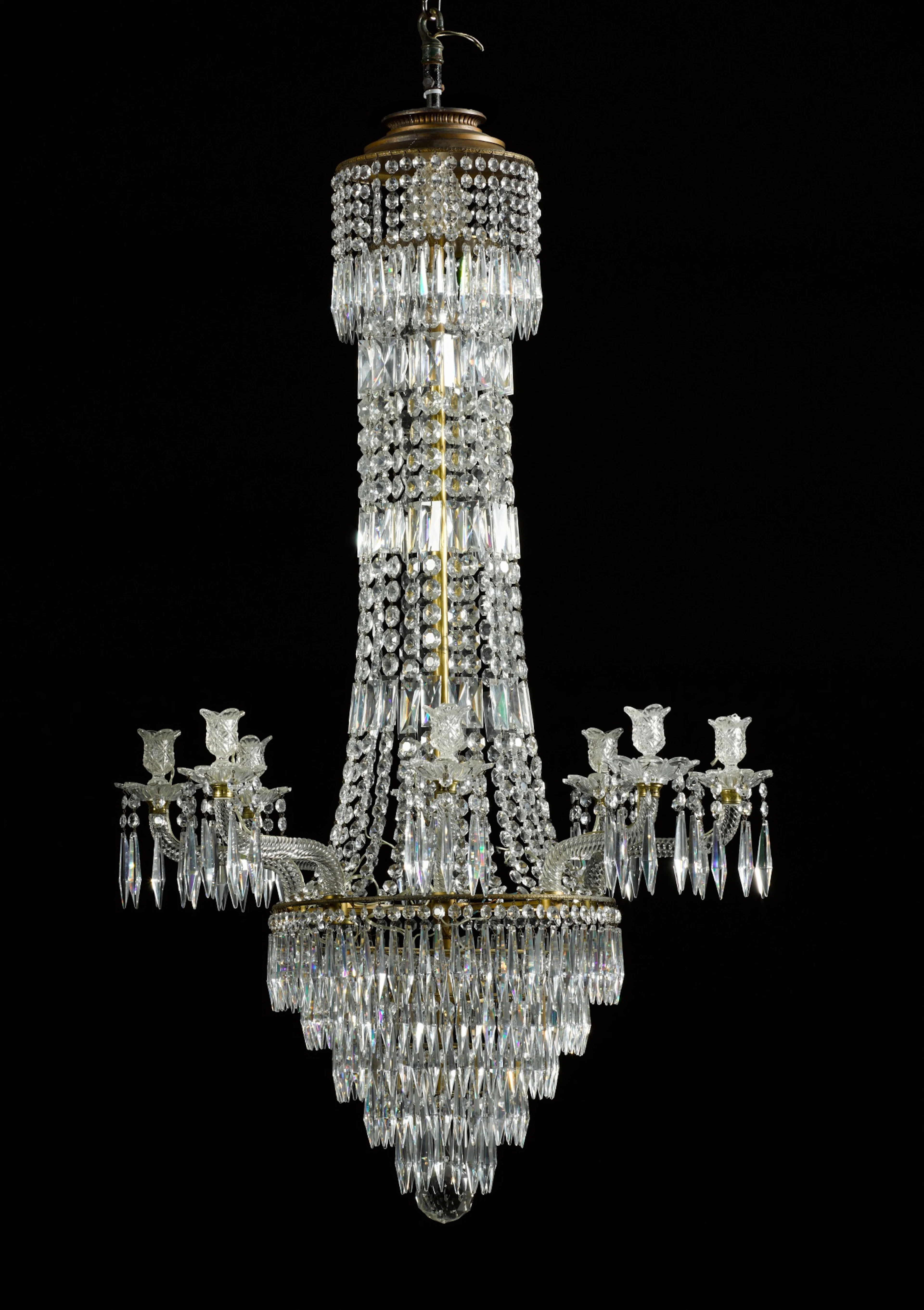 A Regency style brass and cut-glass eight-light chandelier