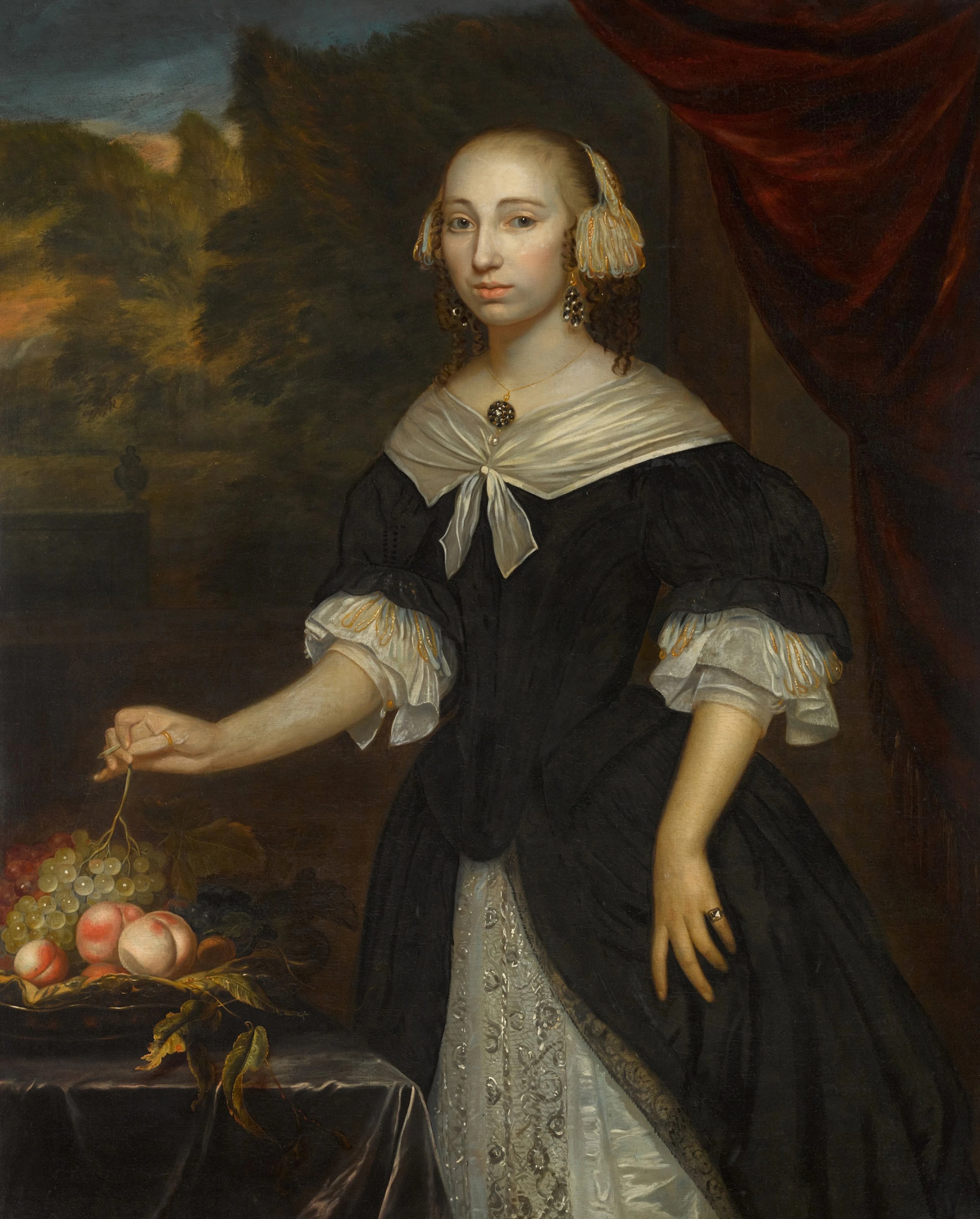 Portrait of a lady, three-quarter length, standing next to a still life of fruit