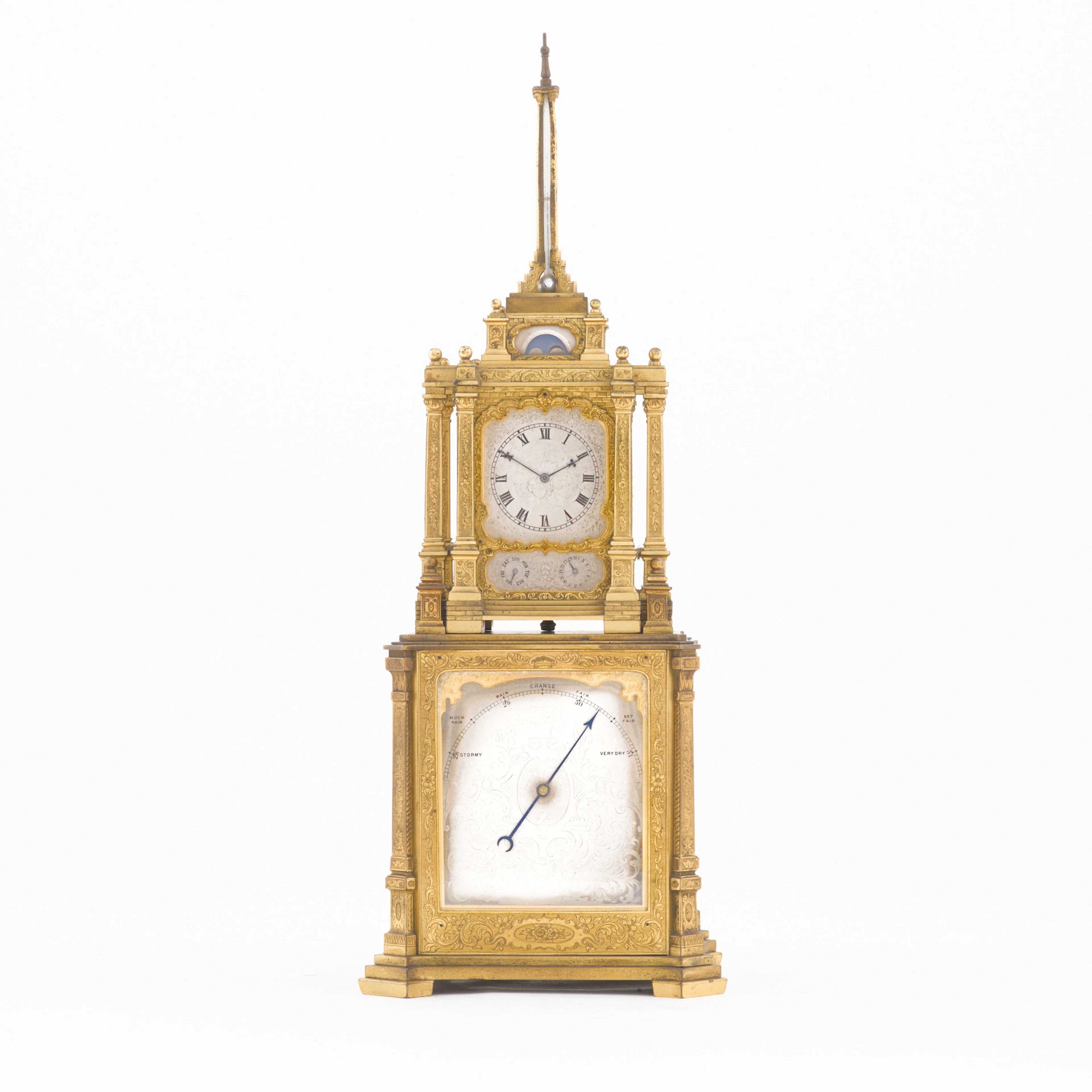 A Victorian engraved gilt-brass desk clock compendium in...