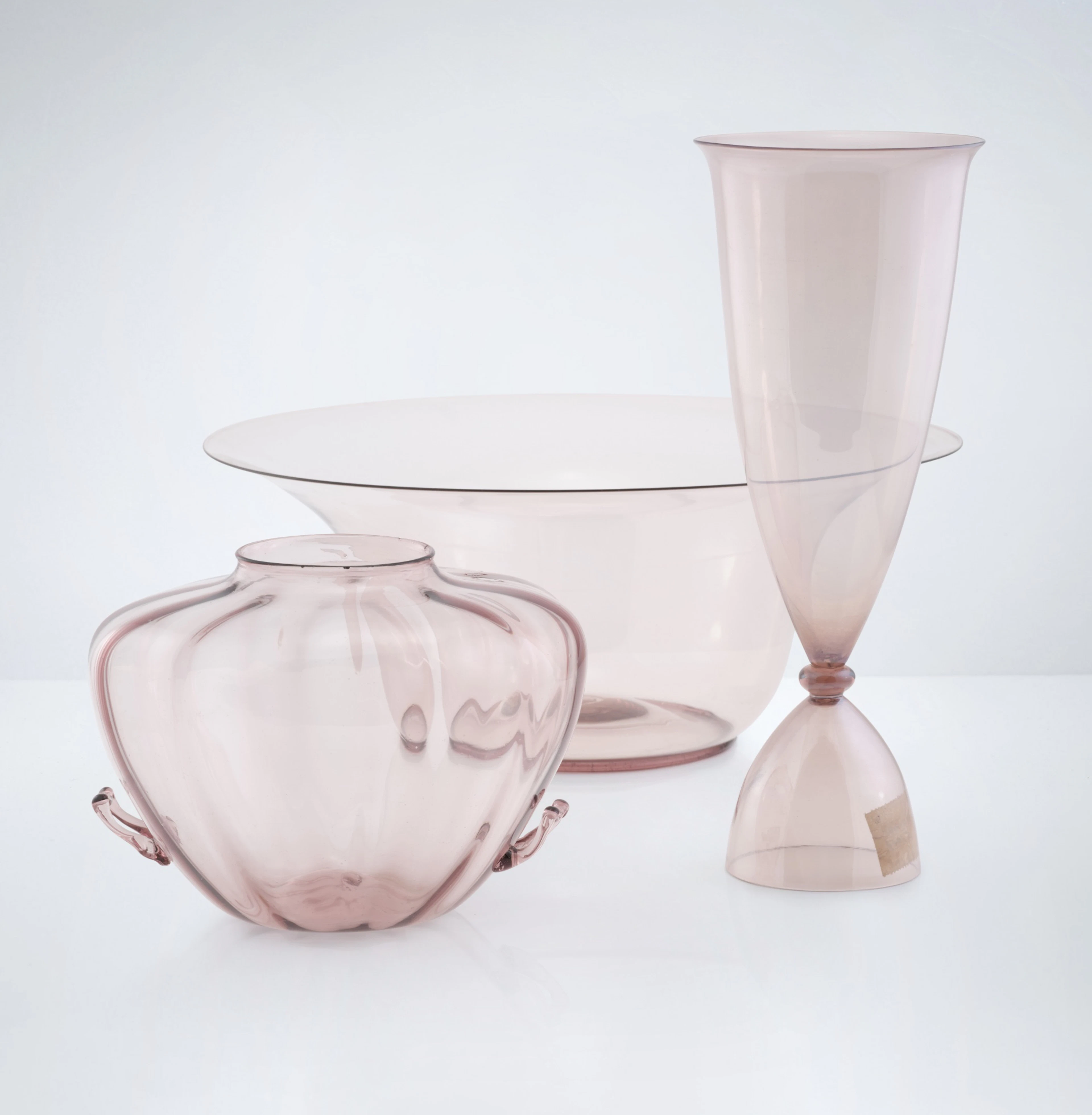Two amethist vases and one bowl