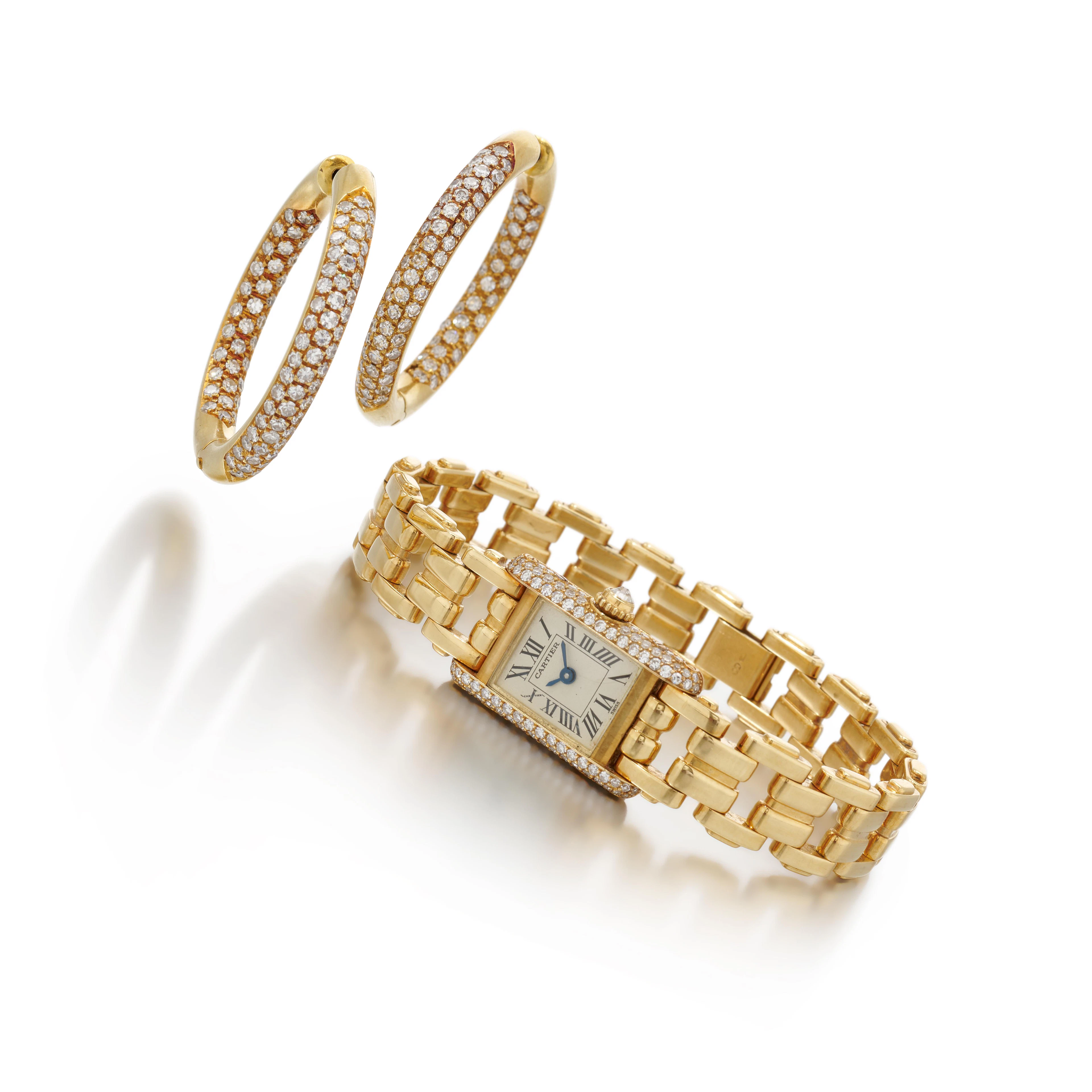 Cartier, diamond wristwatch and a pair of diamond...