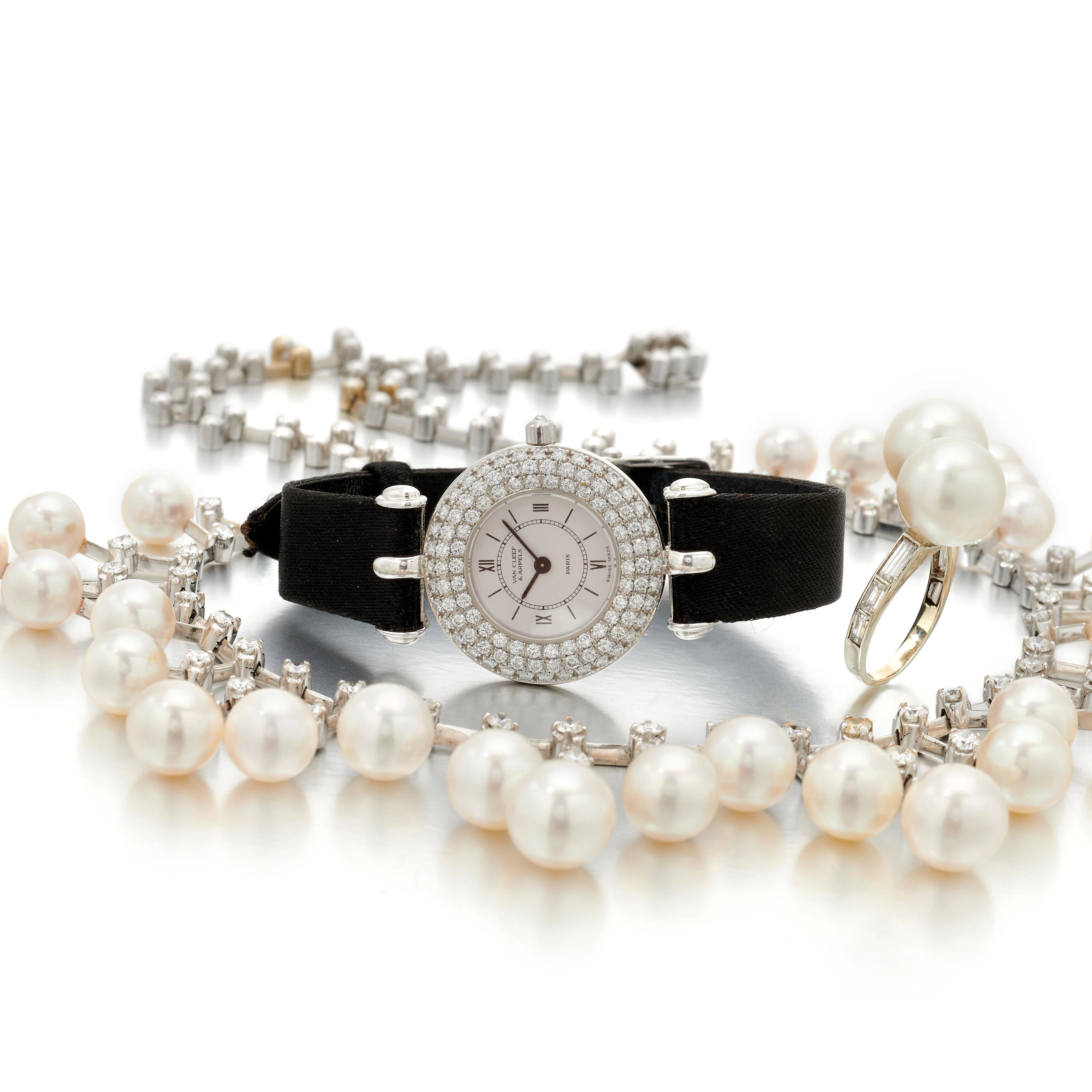 Cultured pearl and diamond necklace and ring and a...