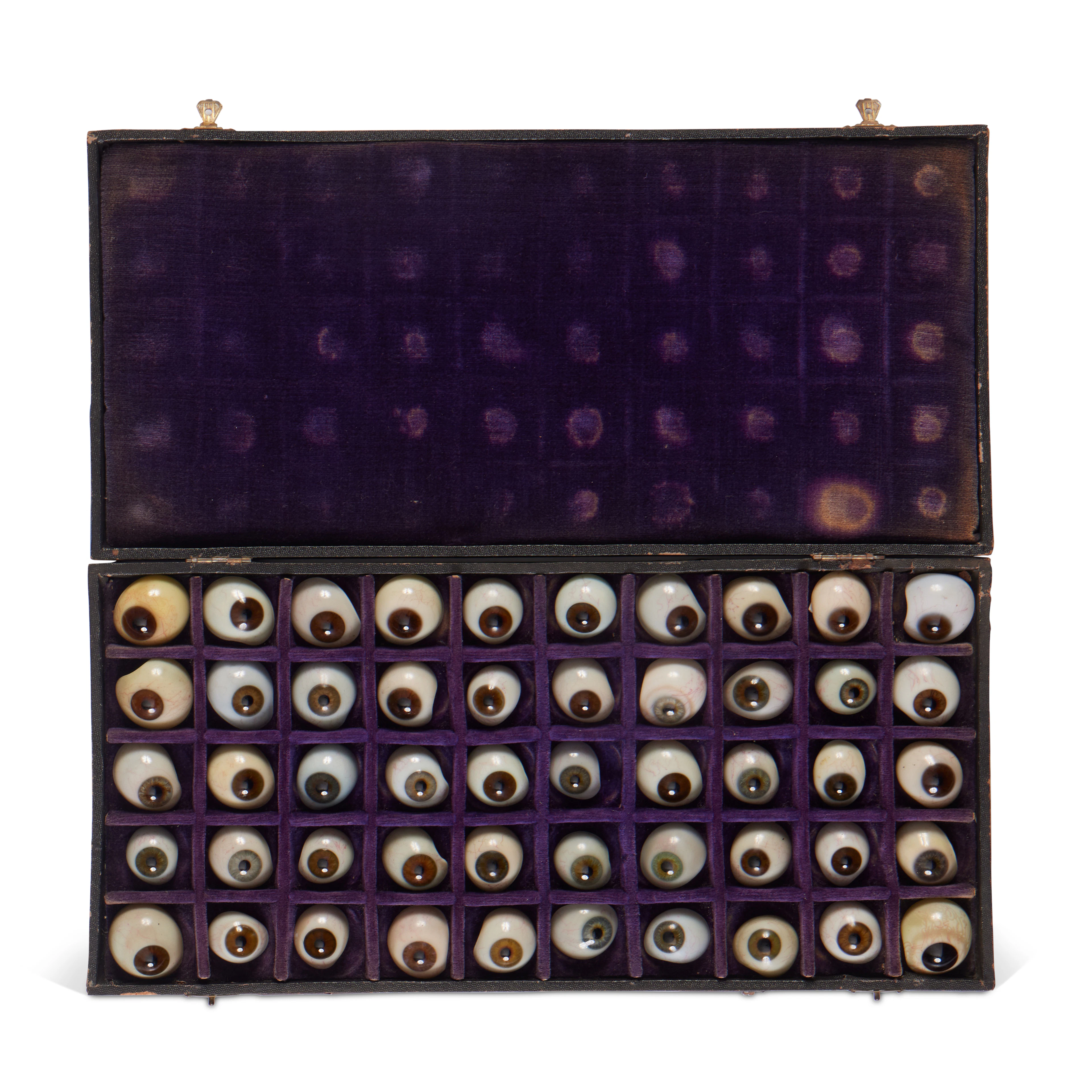 A Cased Set of Prosthetic Handblown Glass Eyes