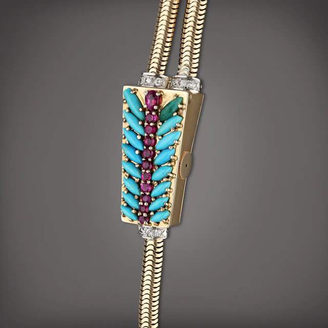 Retailed by Cartier: A yellow gold and diamond
