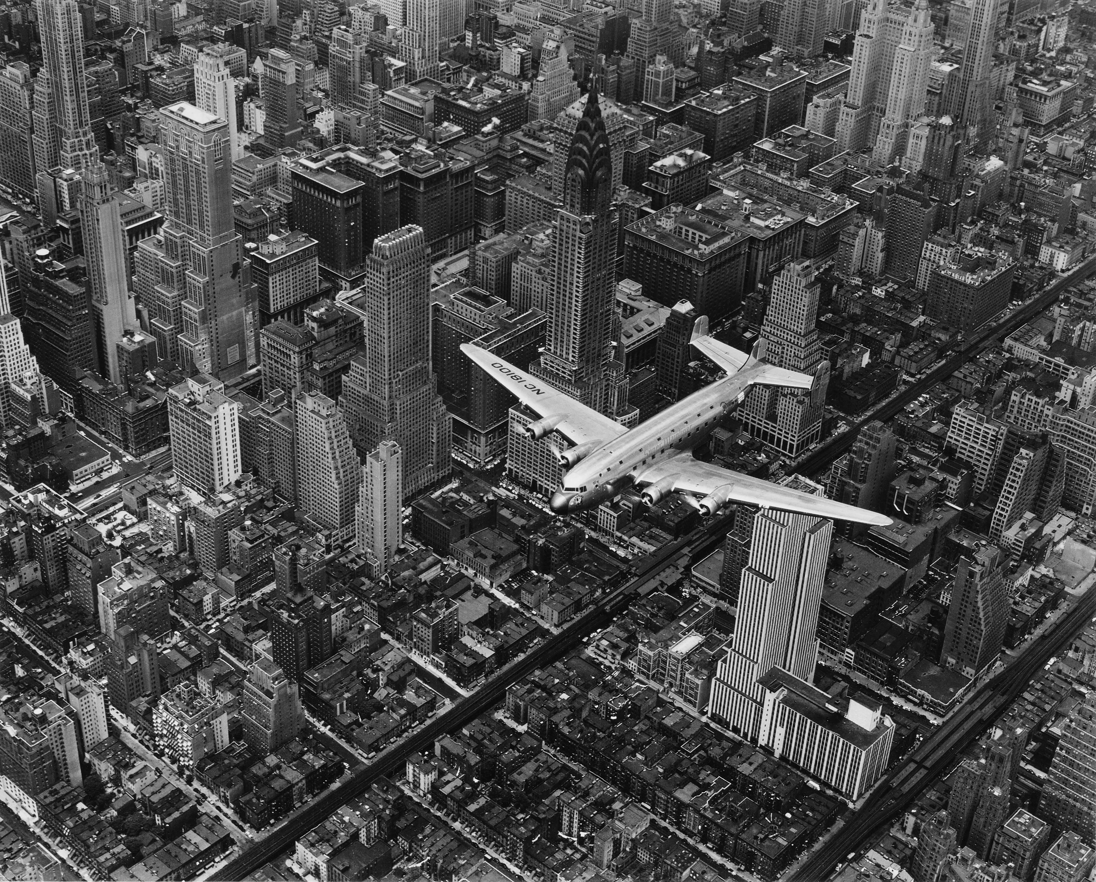 'A DC-4 Flying over New York City'