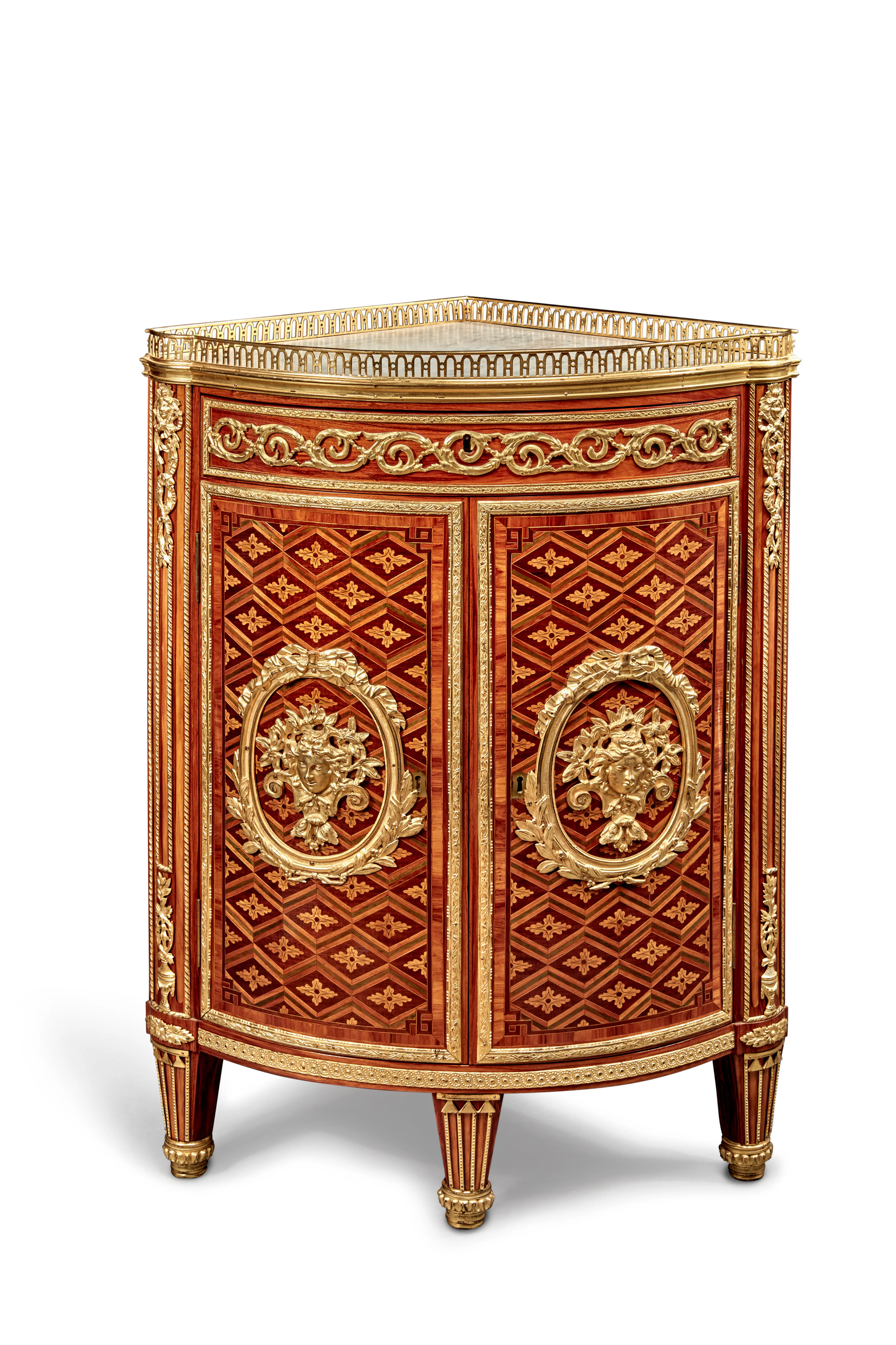 A Louis XVI Gilt-Bronze Mounted Tulipwood