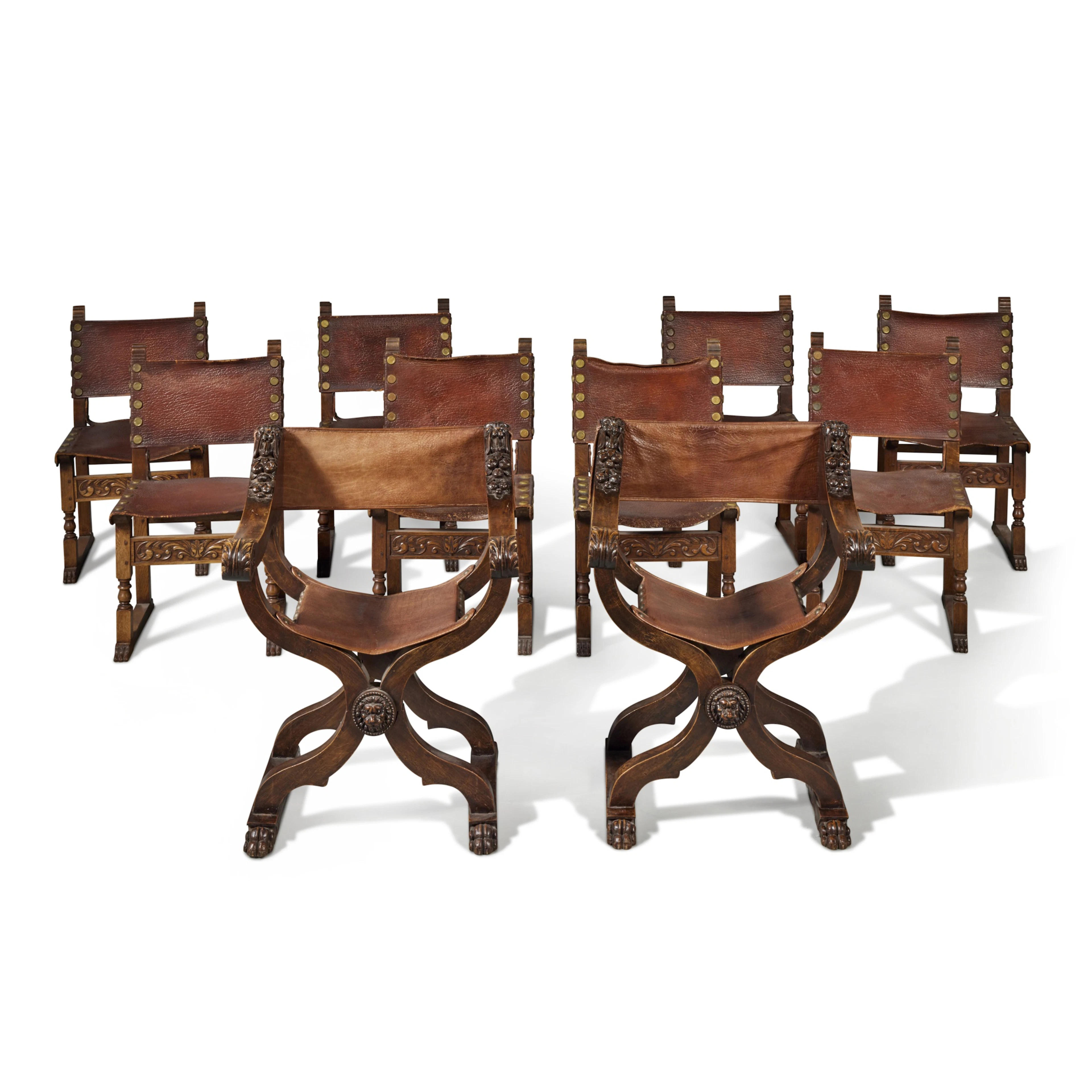 A Pair of Italian Renaissance Style Carved Walnut Savonarola Chairs