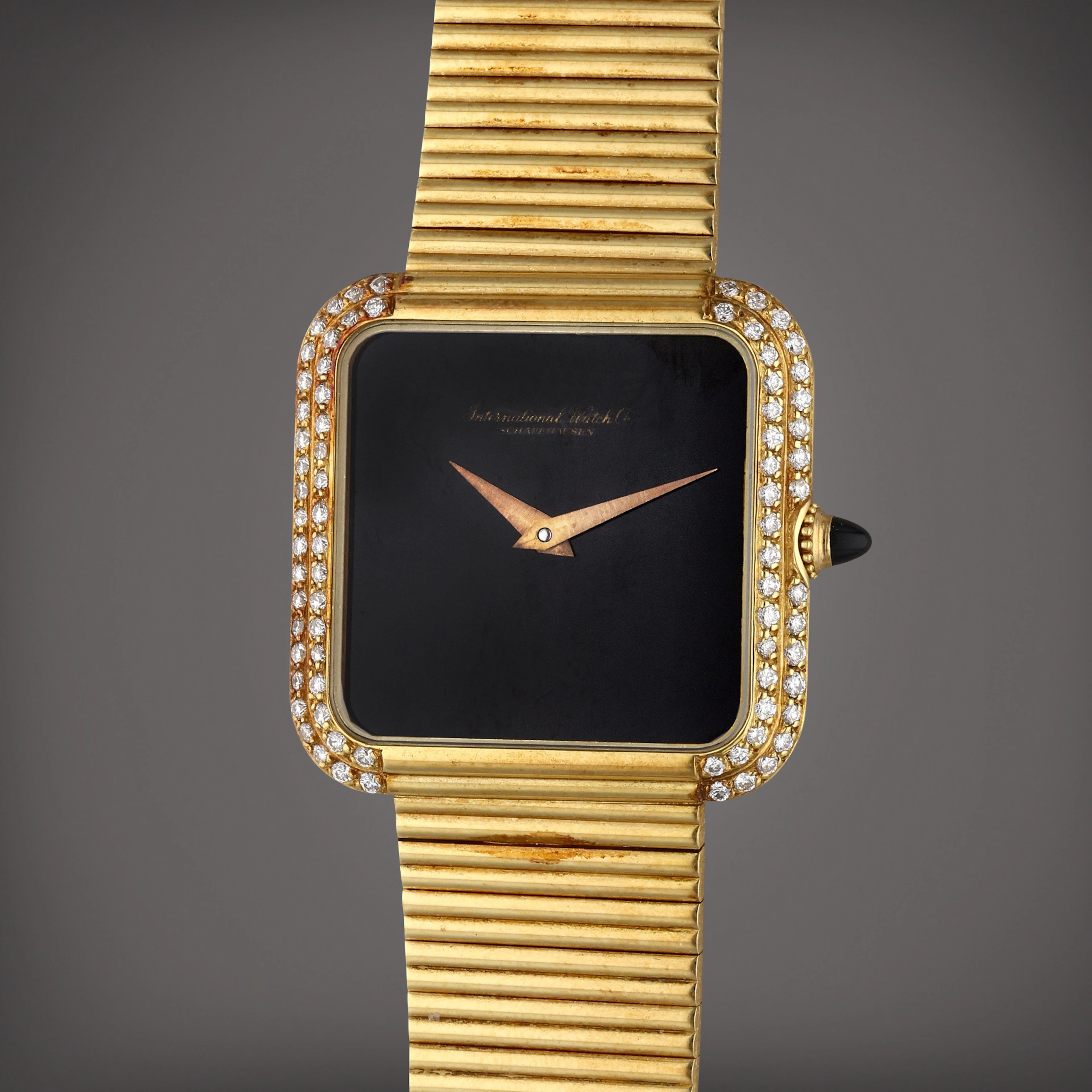 A yellow gold and diamond-set bracelet watch with onyx dial, Circa 1980
