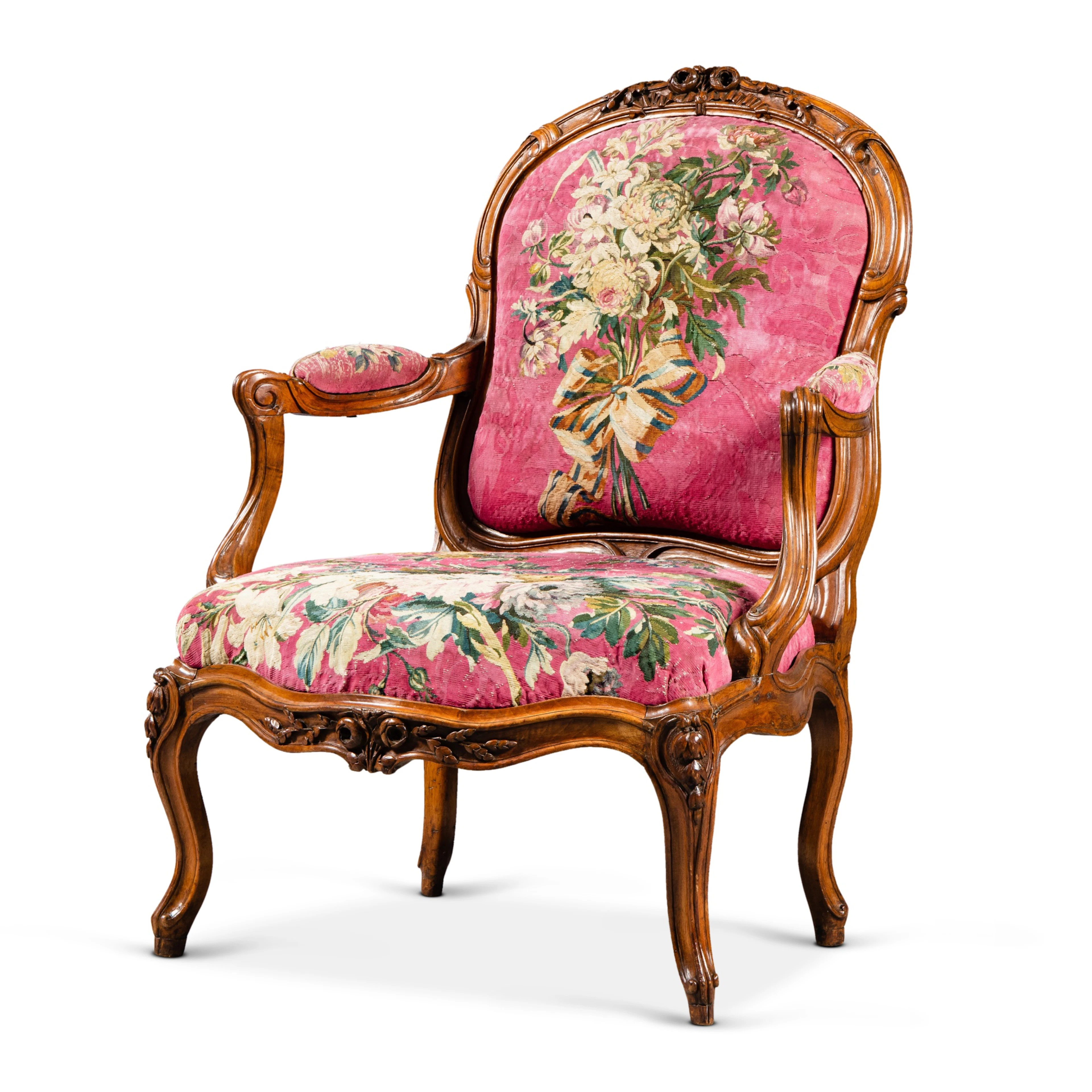 A Louis XV carved walnut "à chassis" armchair