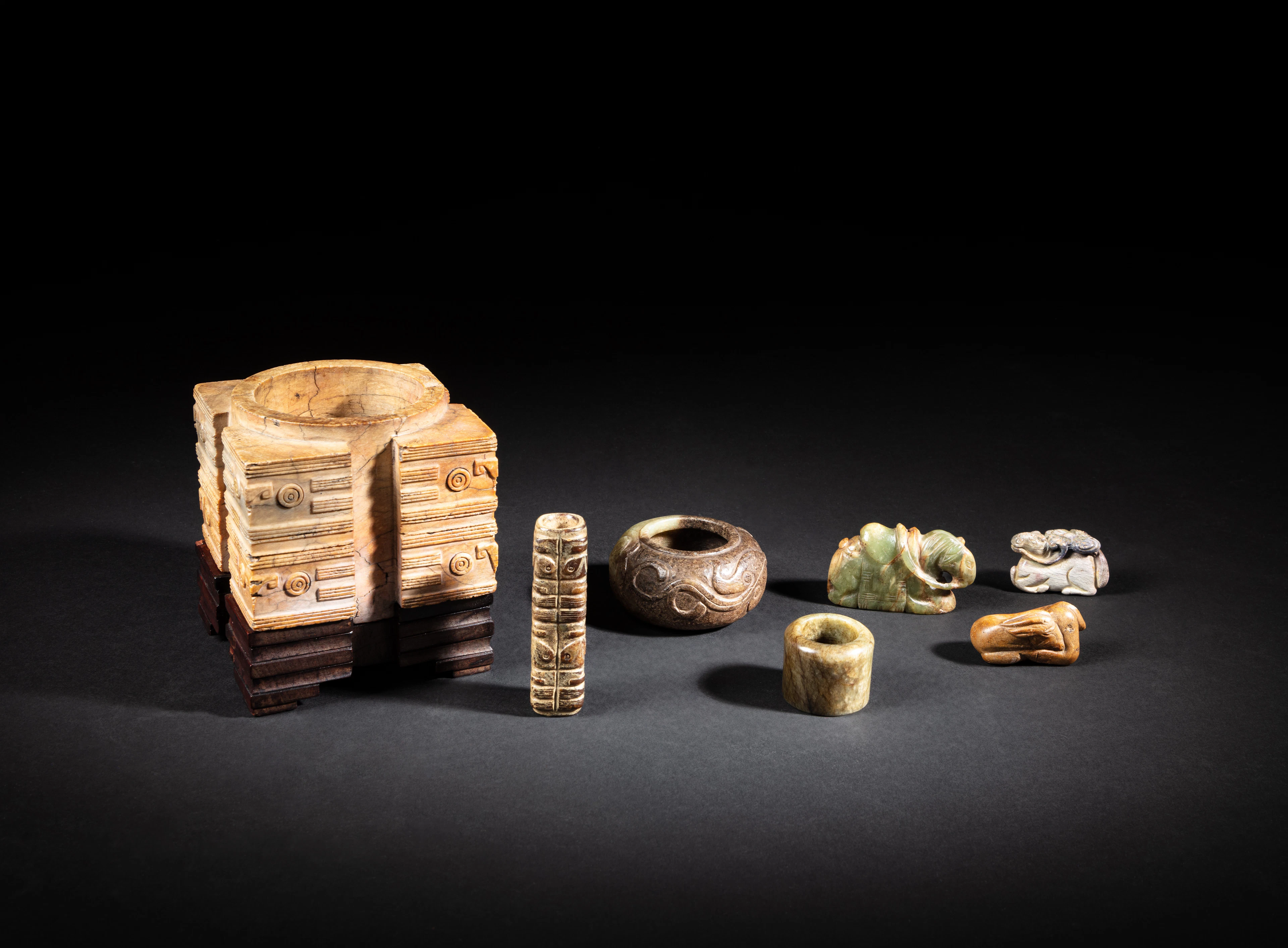A group of seven archaistic jade carvings