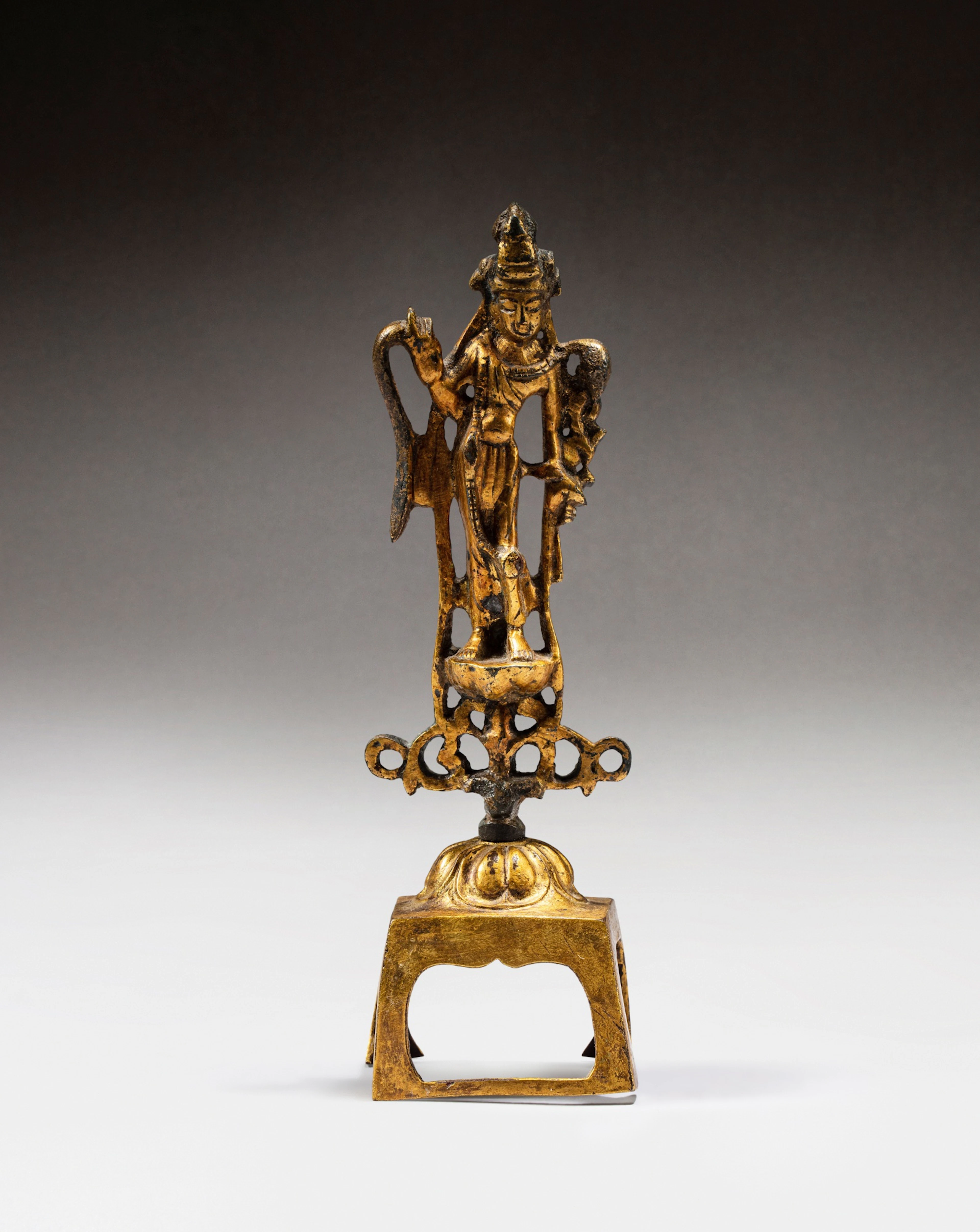 A gilt-bronze figure of Avalokiteshvara, probably Tang dynasty | 或唐 鎏金銅觀世音菩薩立像