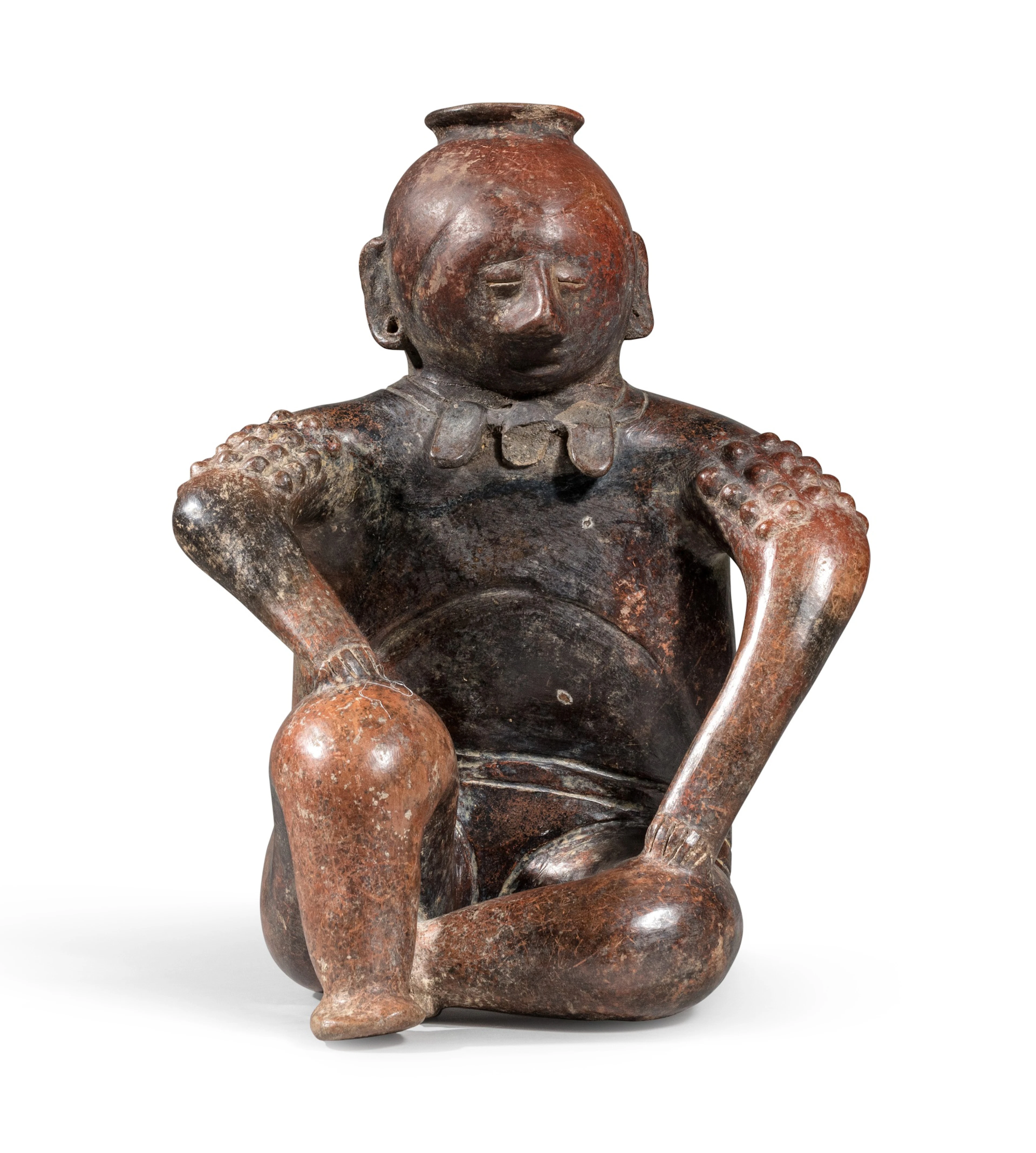 Statue d'un guerrier assis