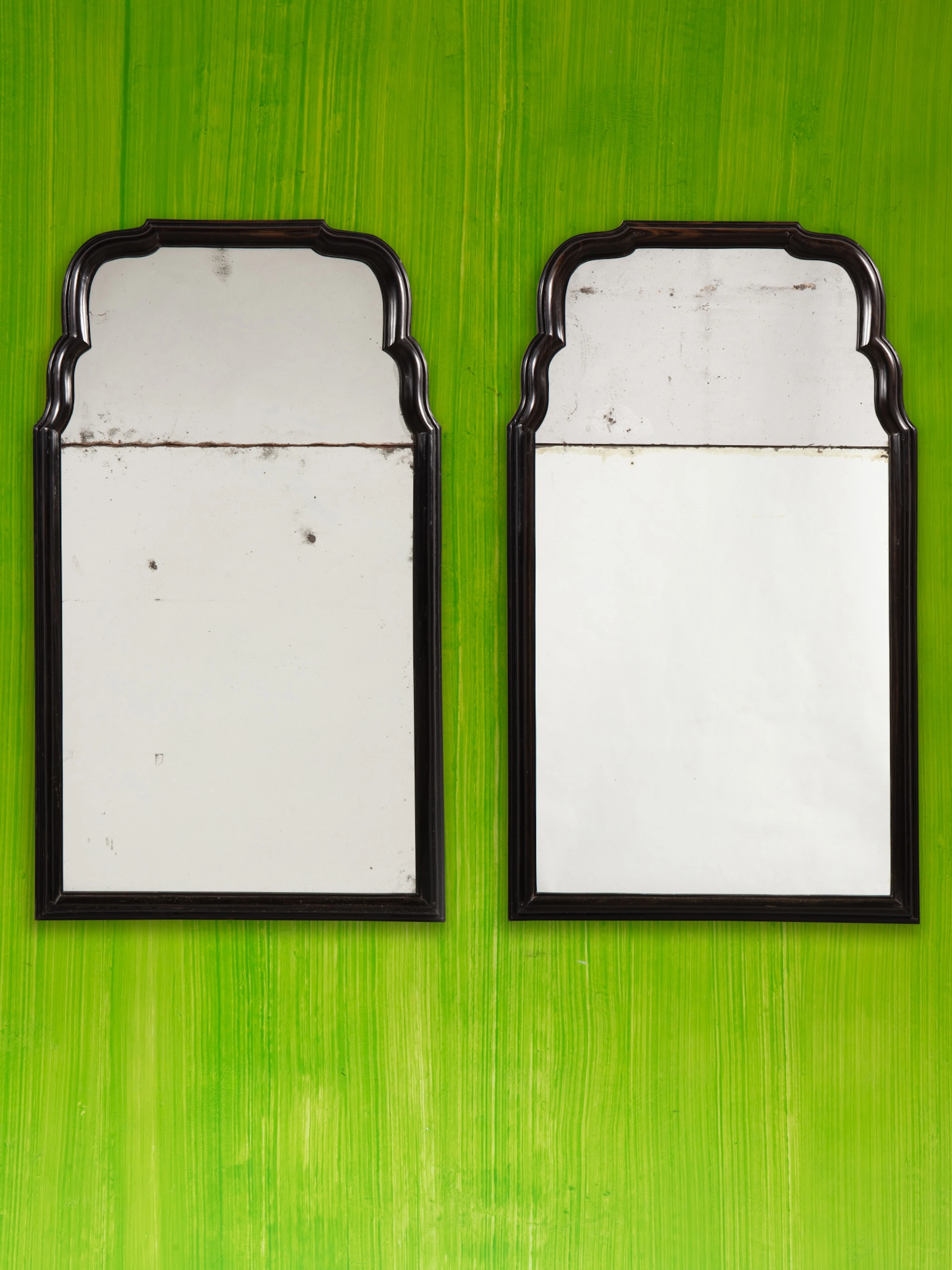 A pair of ebony mirrors