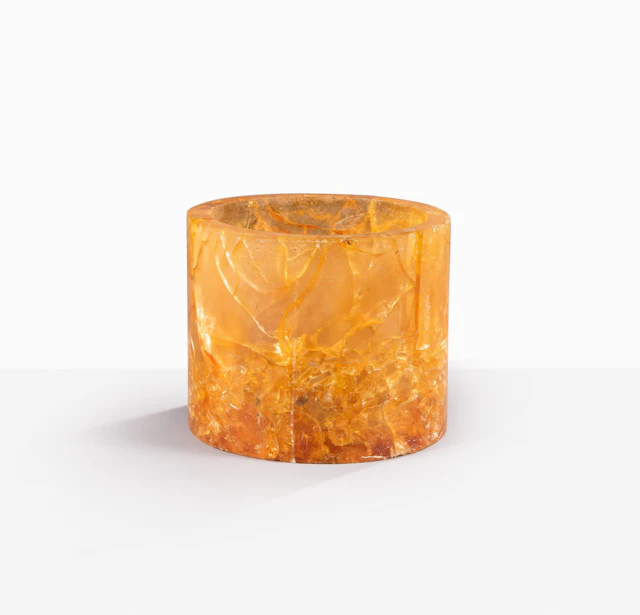 A large French amber-coloured perspex vase
