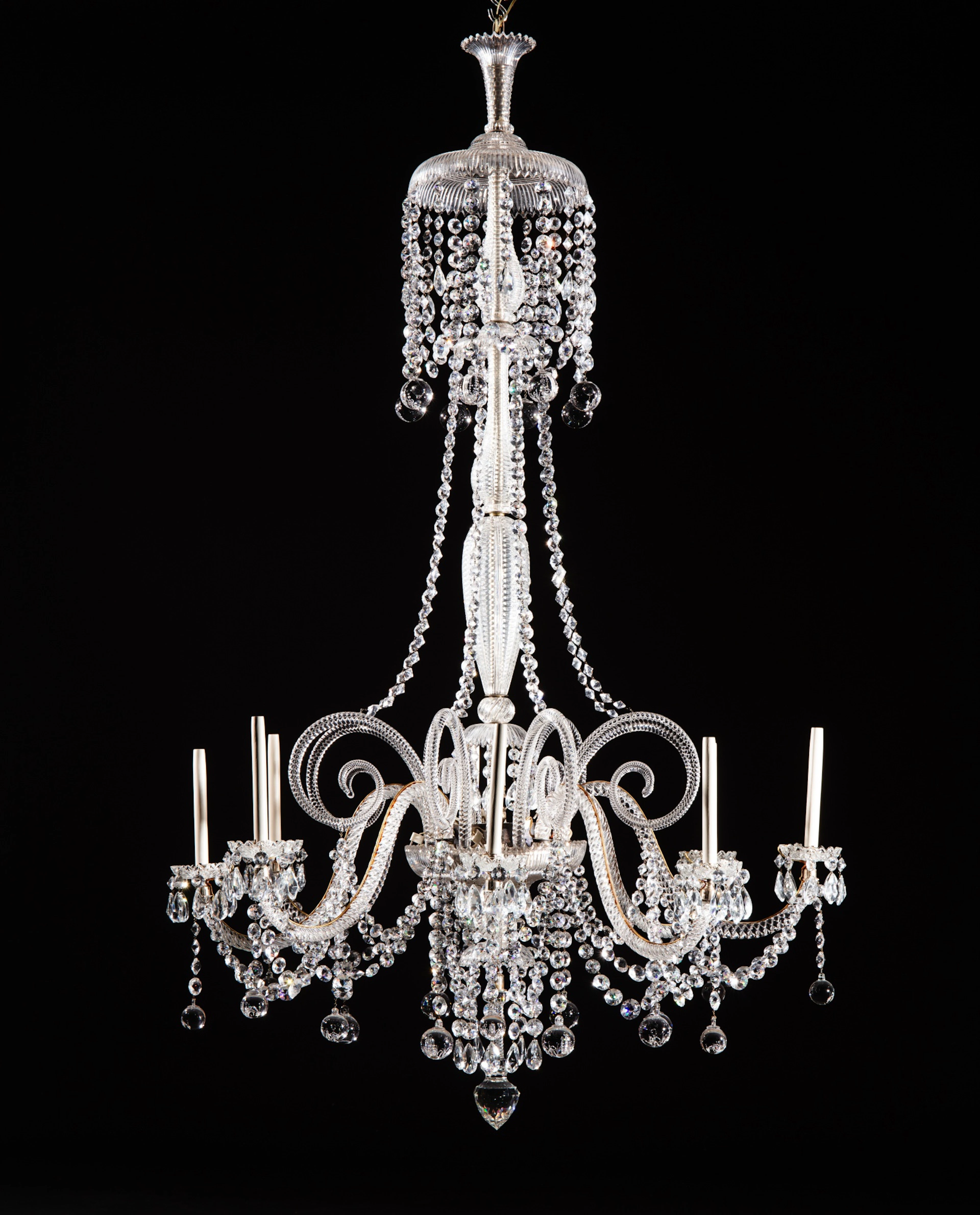 A pair of Victorian cut-glass eight-light chandeliers
