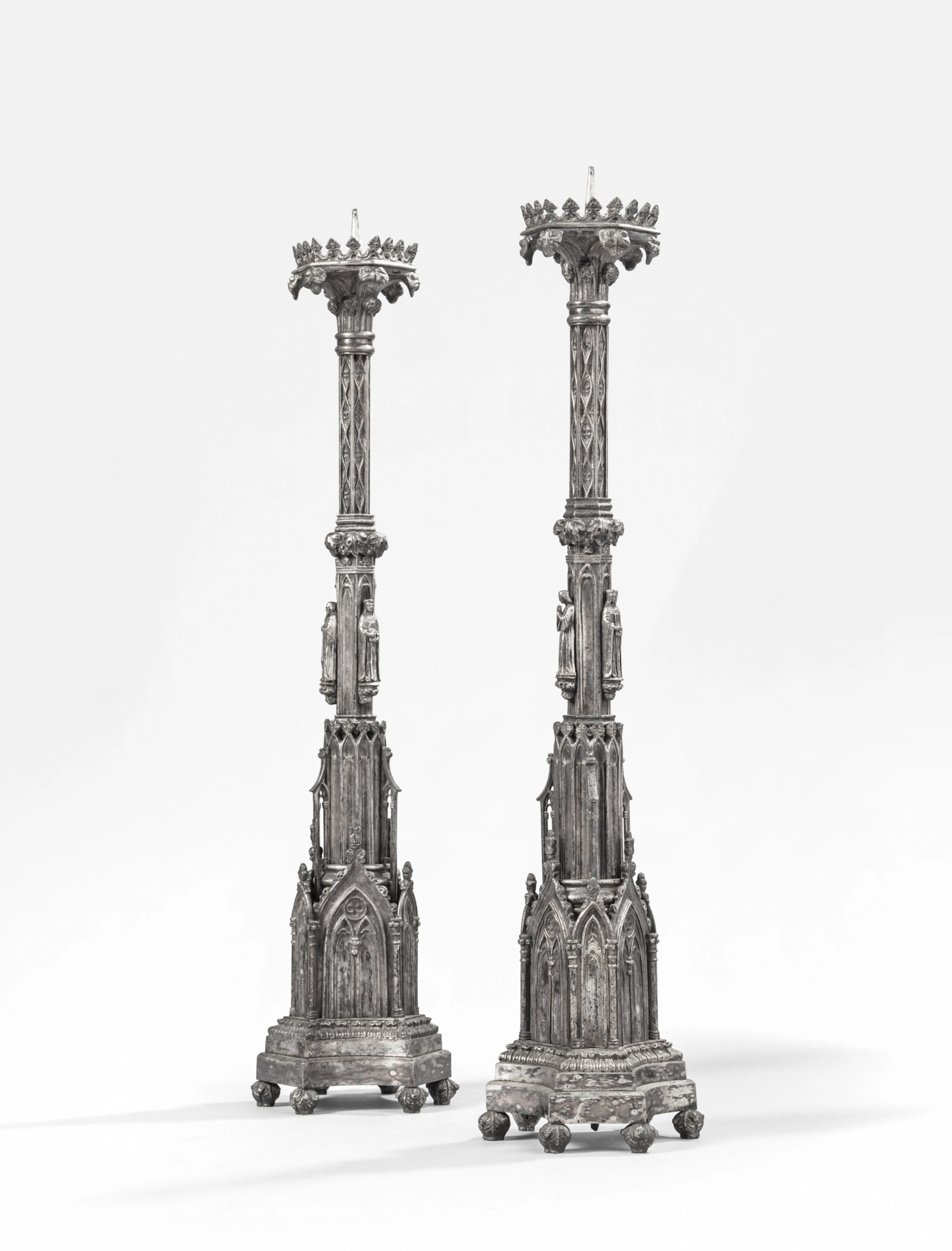 A pair of silver-plated candlesticks
