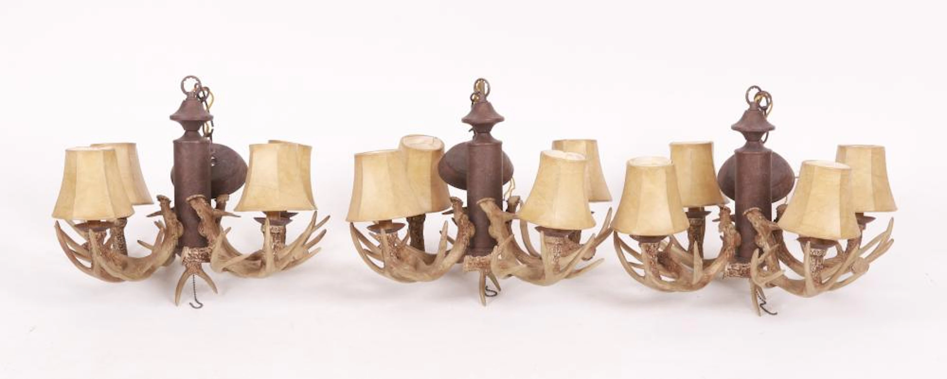 Three Faux Antler Four Light Chandeliers