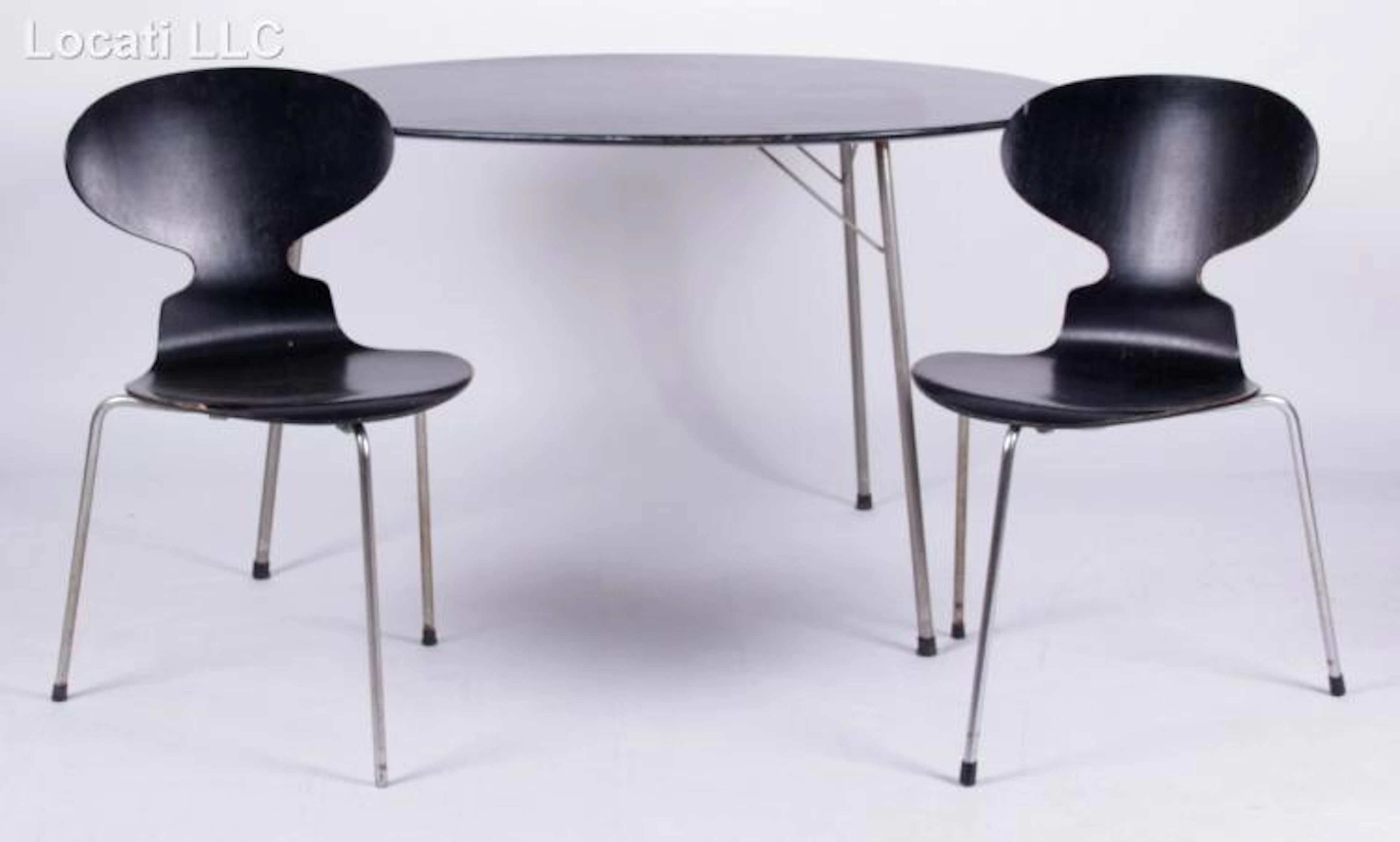 ARNE JACOBSEN Egg Table and Two 3107 Chairs