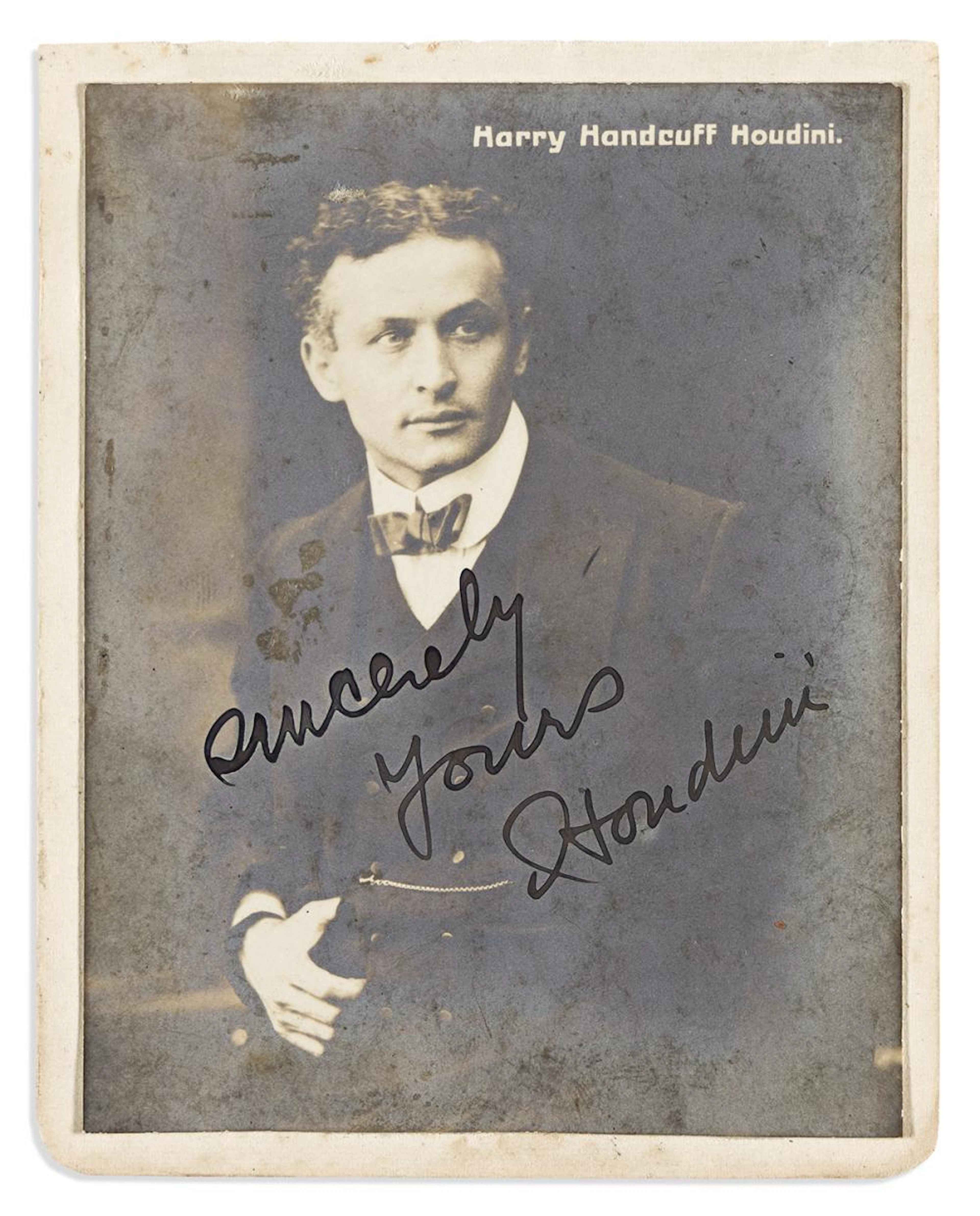 HOUDINI, HARRY. Photograph Signed and Inscribed, "Sincerely / Yours / Houdini,"