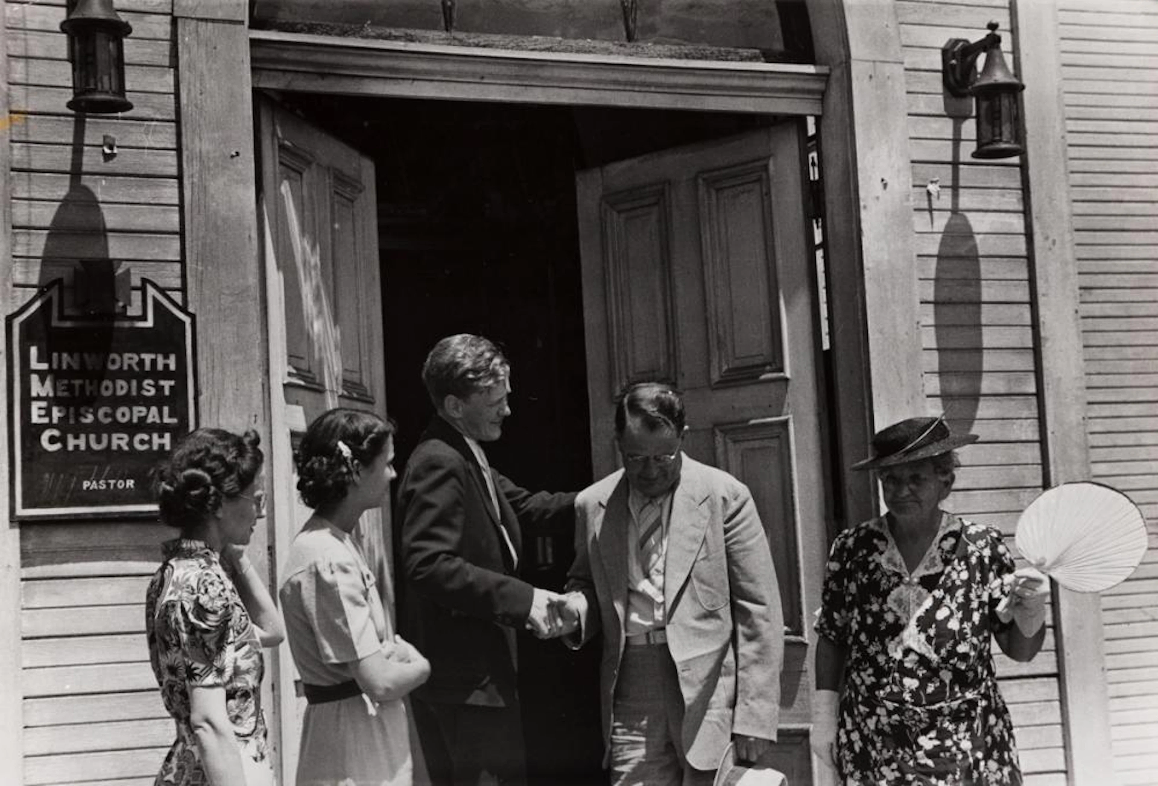BEN SHAHN (1898-1969) Pastor greeting his parishoners, Linworth, Ohio.