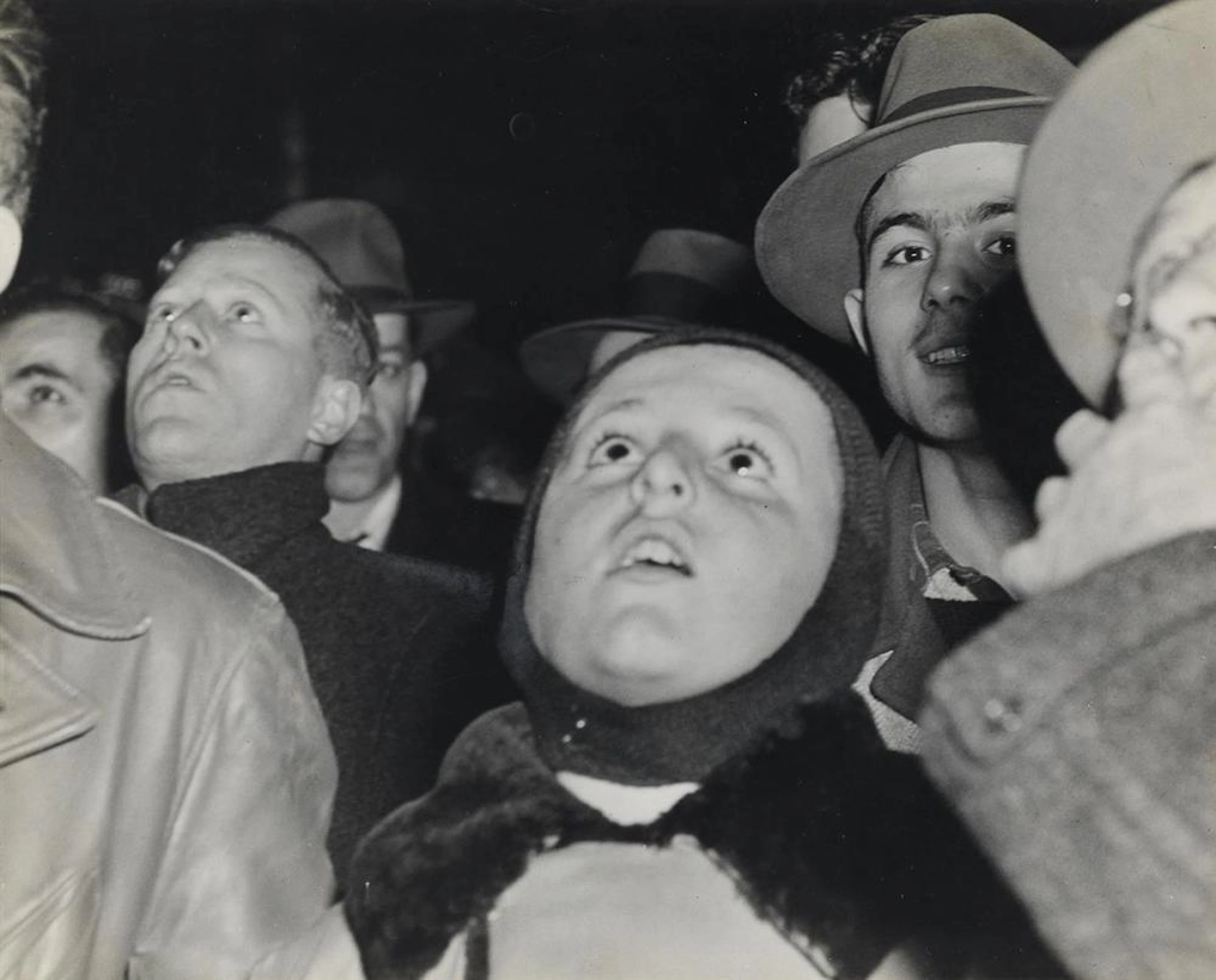 WEEGEE [ARTHUR FELLIG] (1899-1968) Crowd watching results of Pres