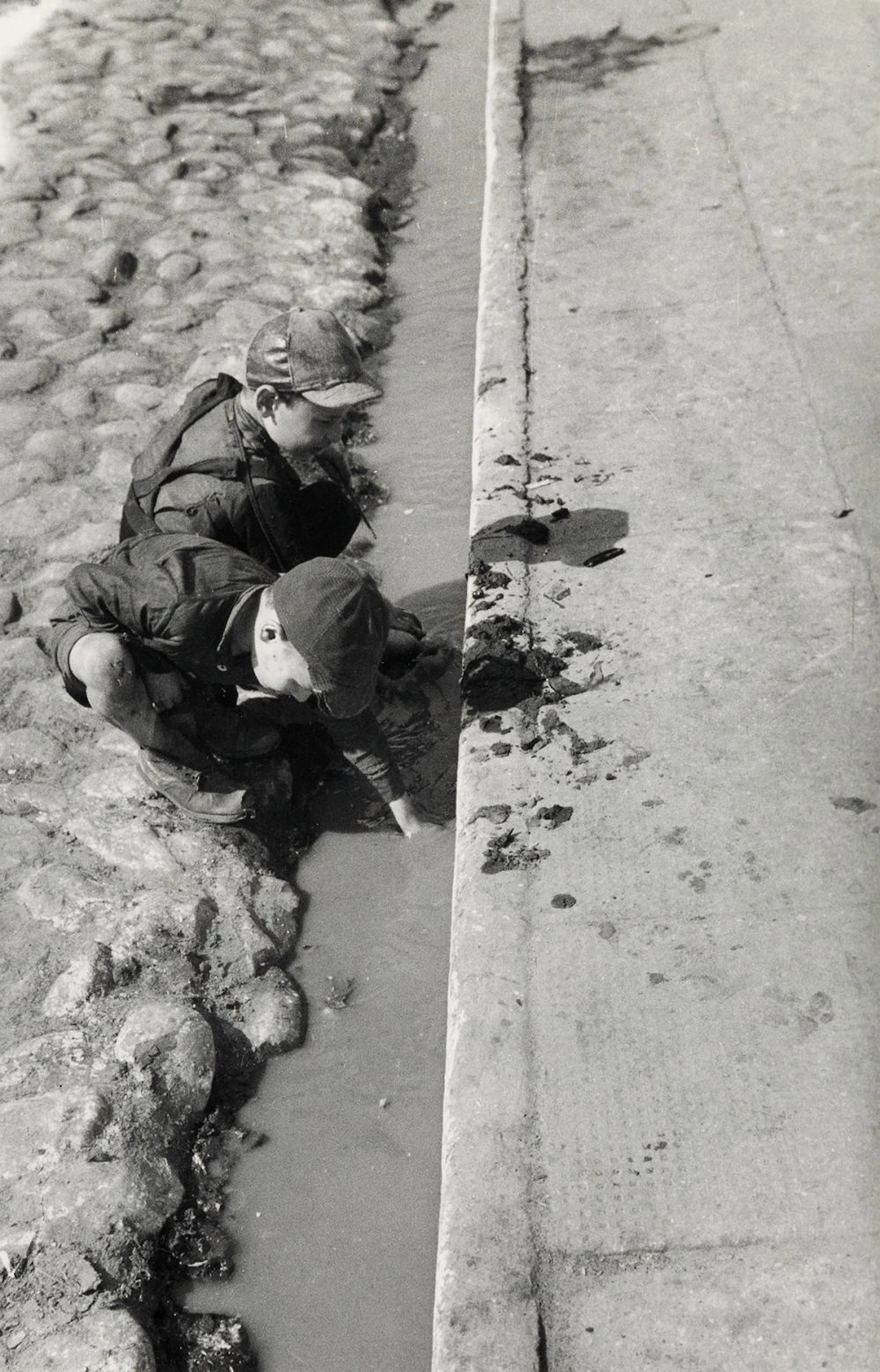 ROMAN VISHNIAC (1897-1990) Jewish children fishing, Lodz, Poland.