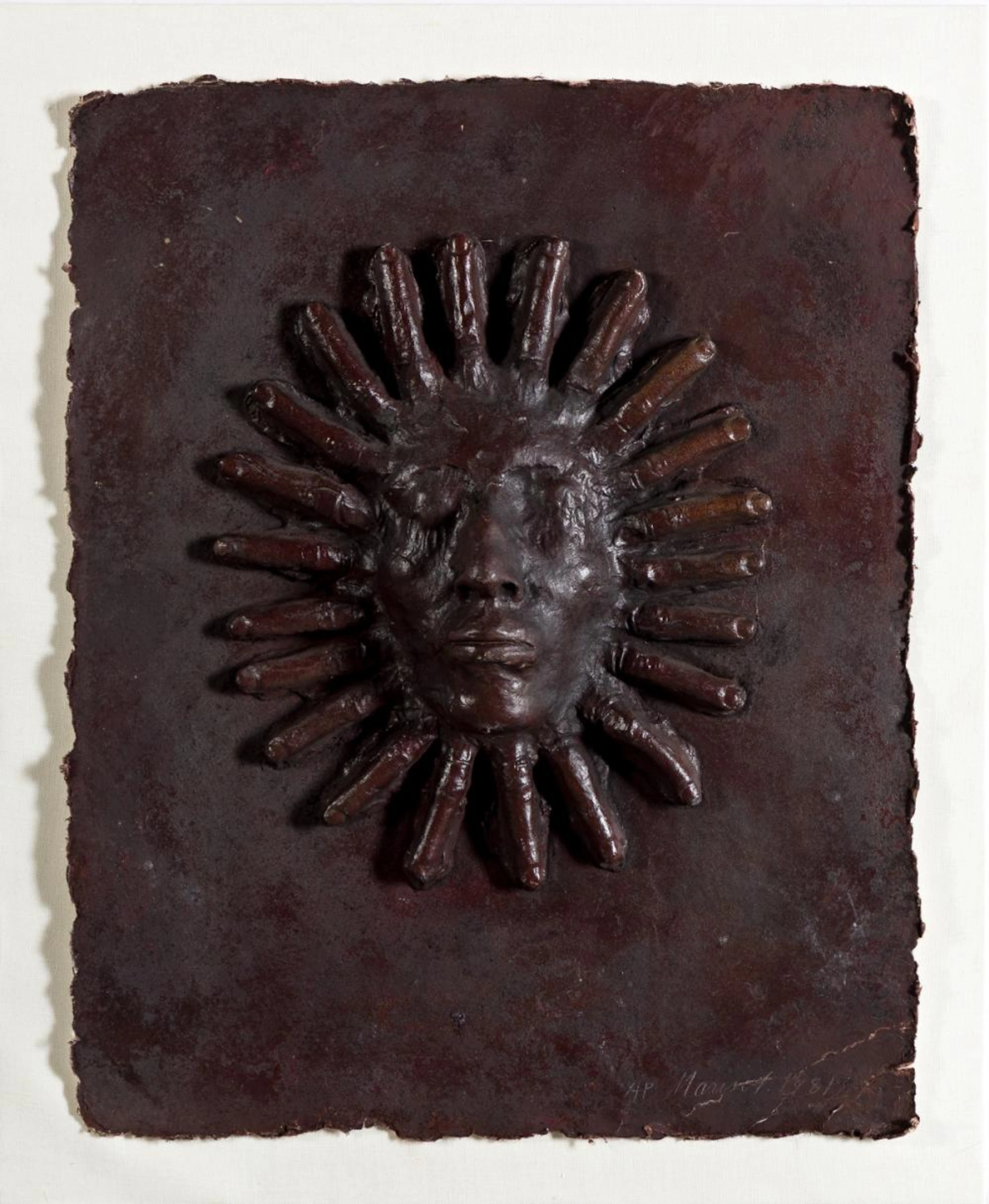 MARISOL ESCOBAR Three painted cast paper masks.