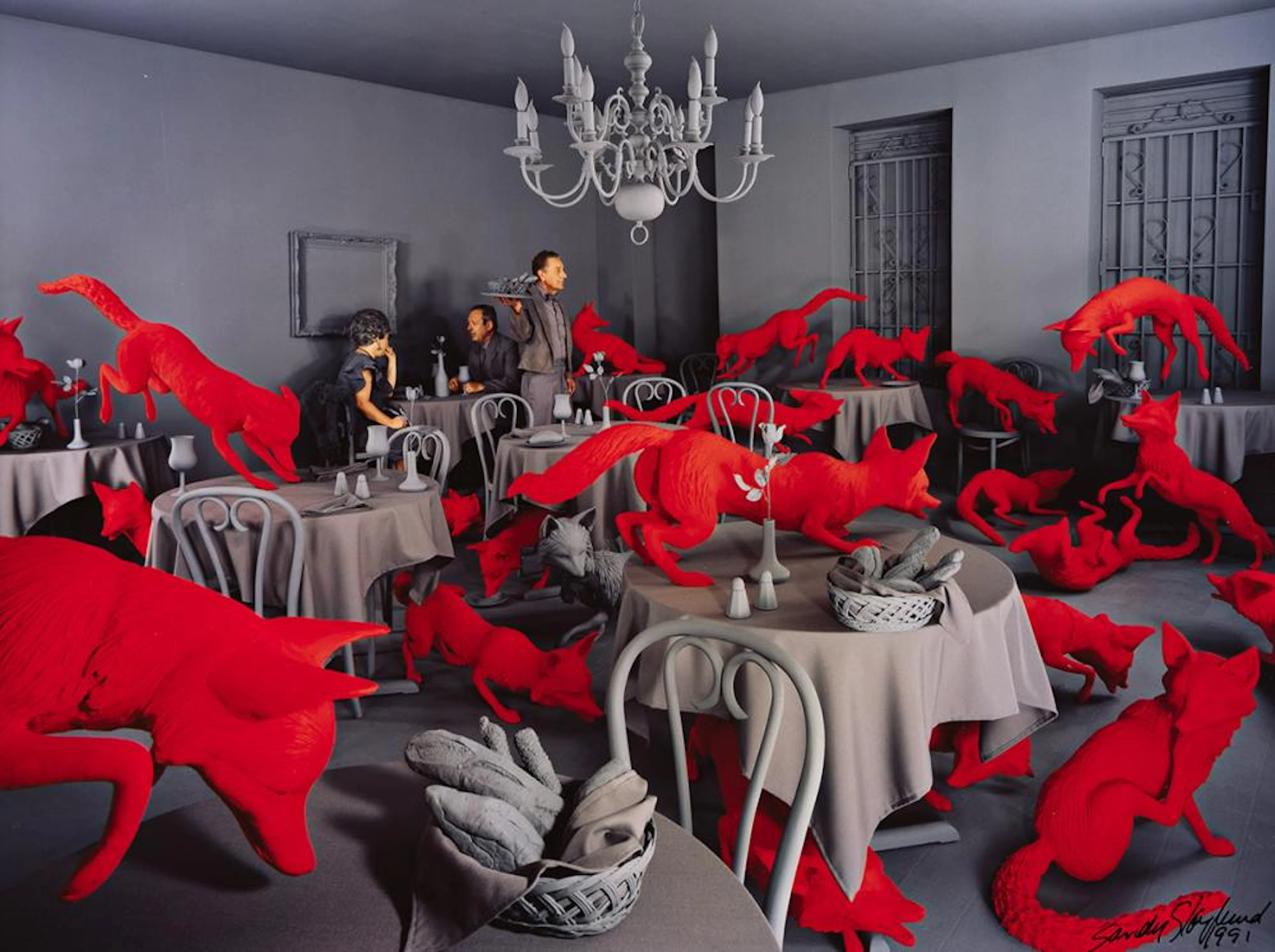 SANDY SKOGLUND (1946- ) The Red Foxes (Fox Games).