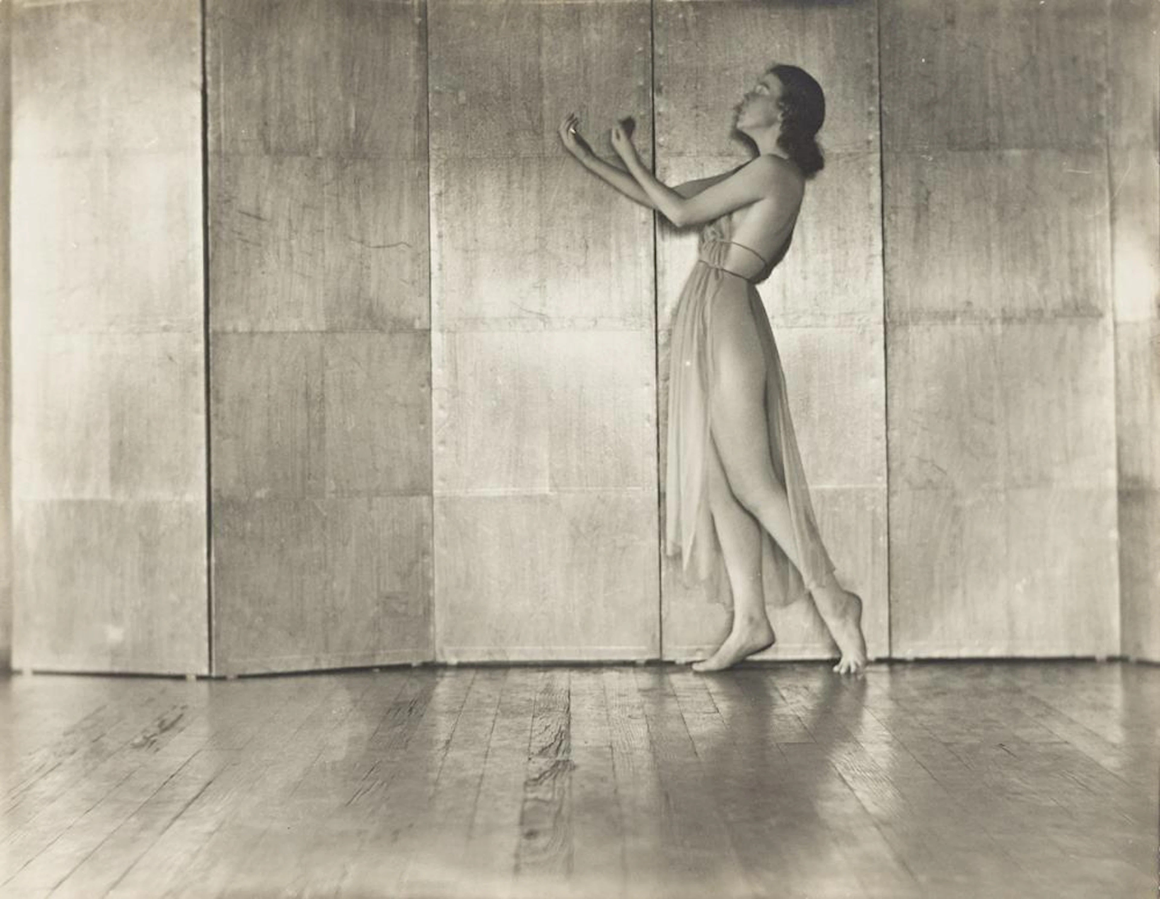 EDWARD WESTON (1886-1958) Dancer in front of a silver screen, Glendale Studio.