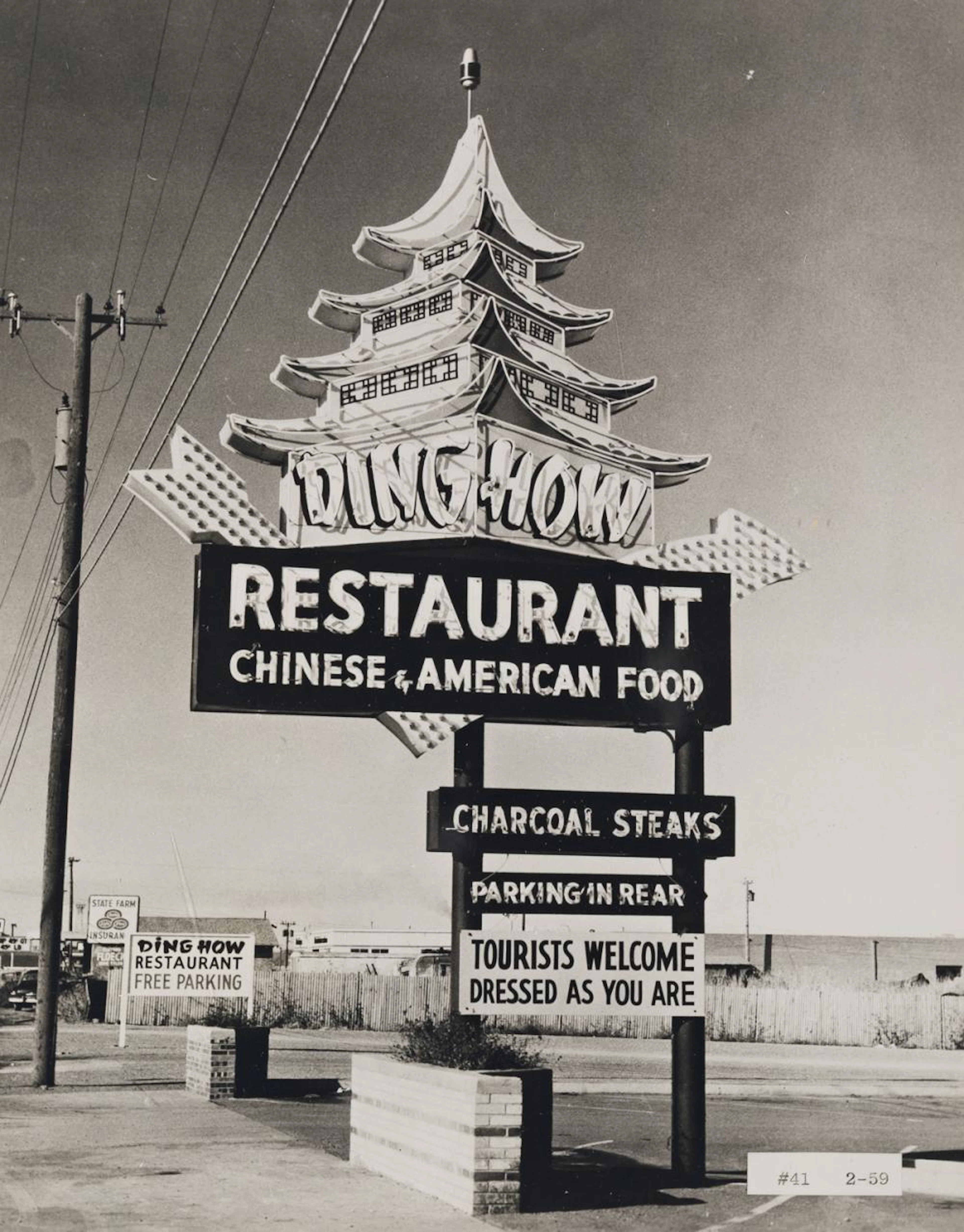 (NEON SIGNAGE) A group of approximately 105 photographs...